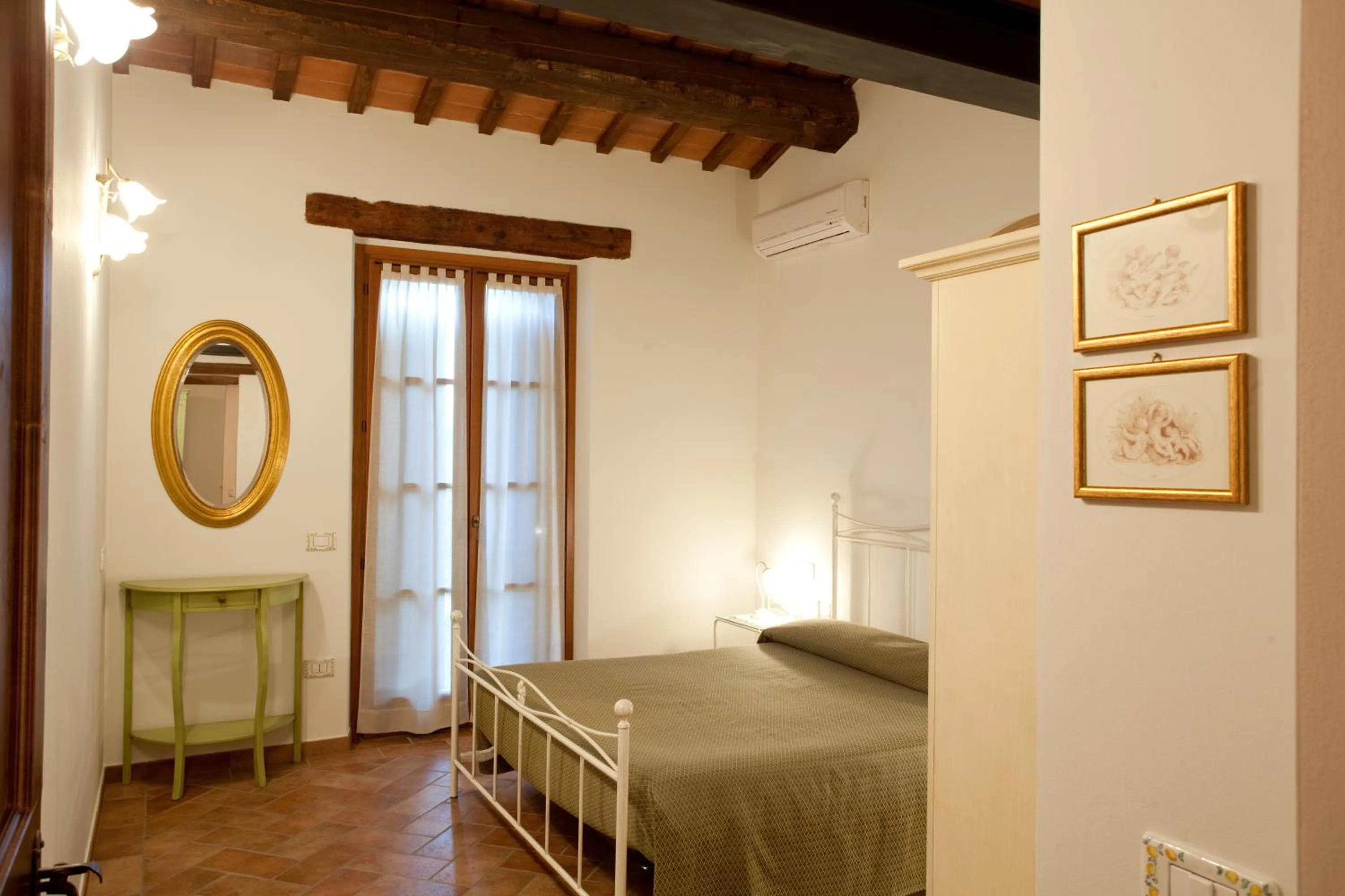 Bed in Valle del Metauro Country House