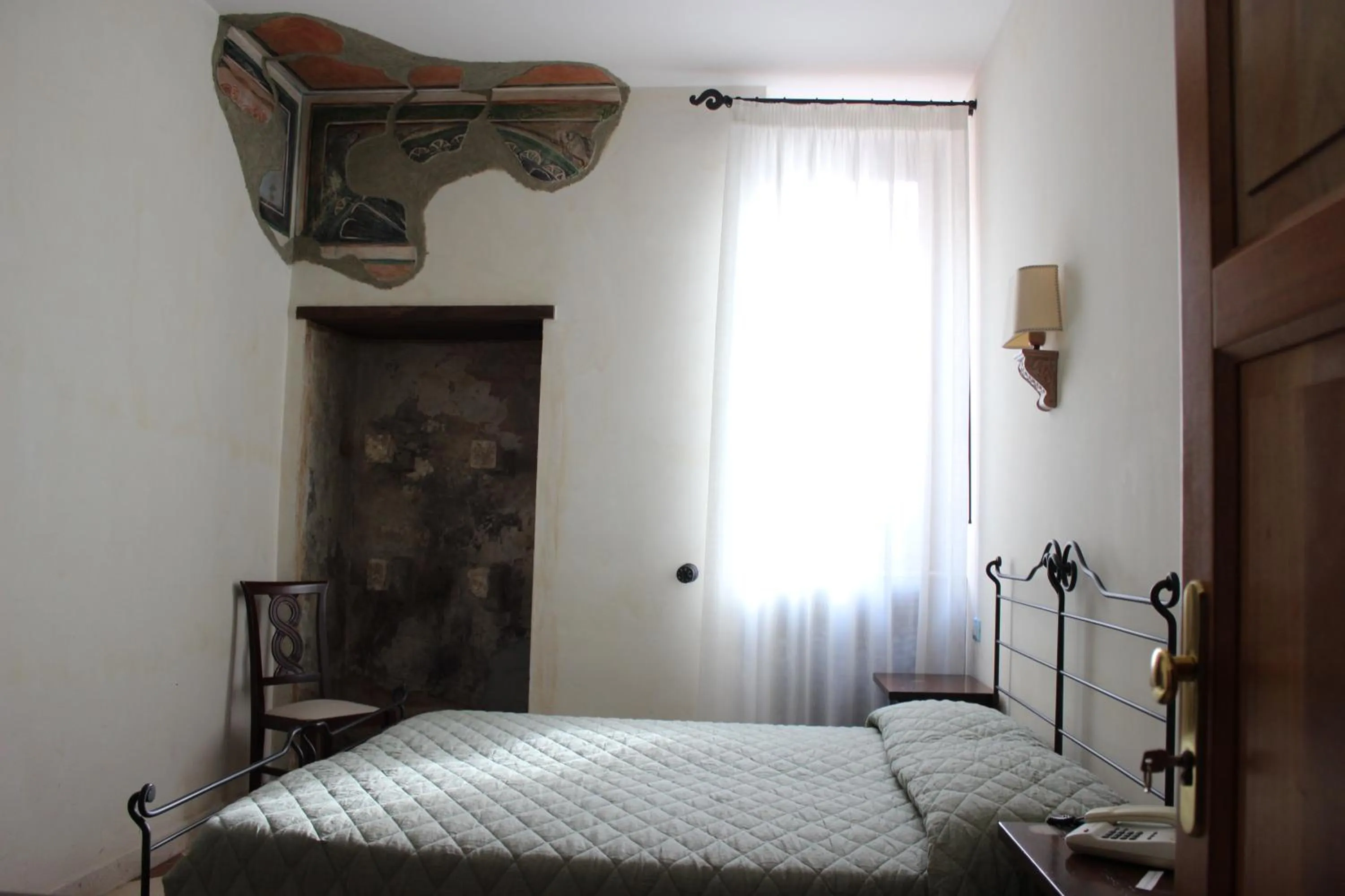 Bed in Villa Cosilinum