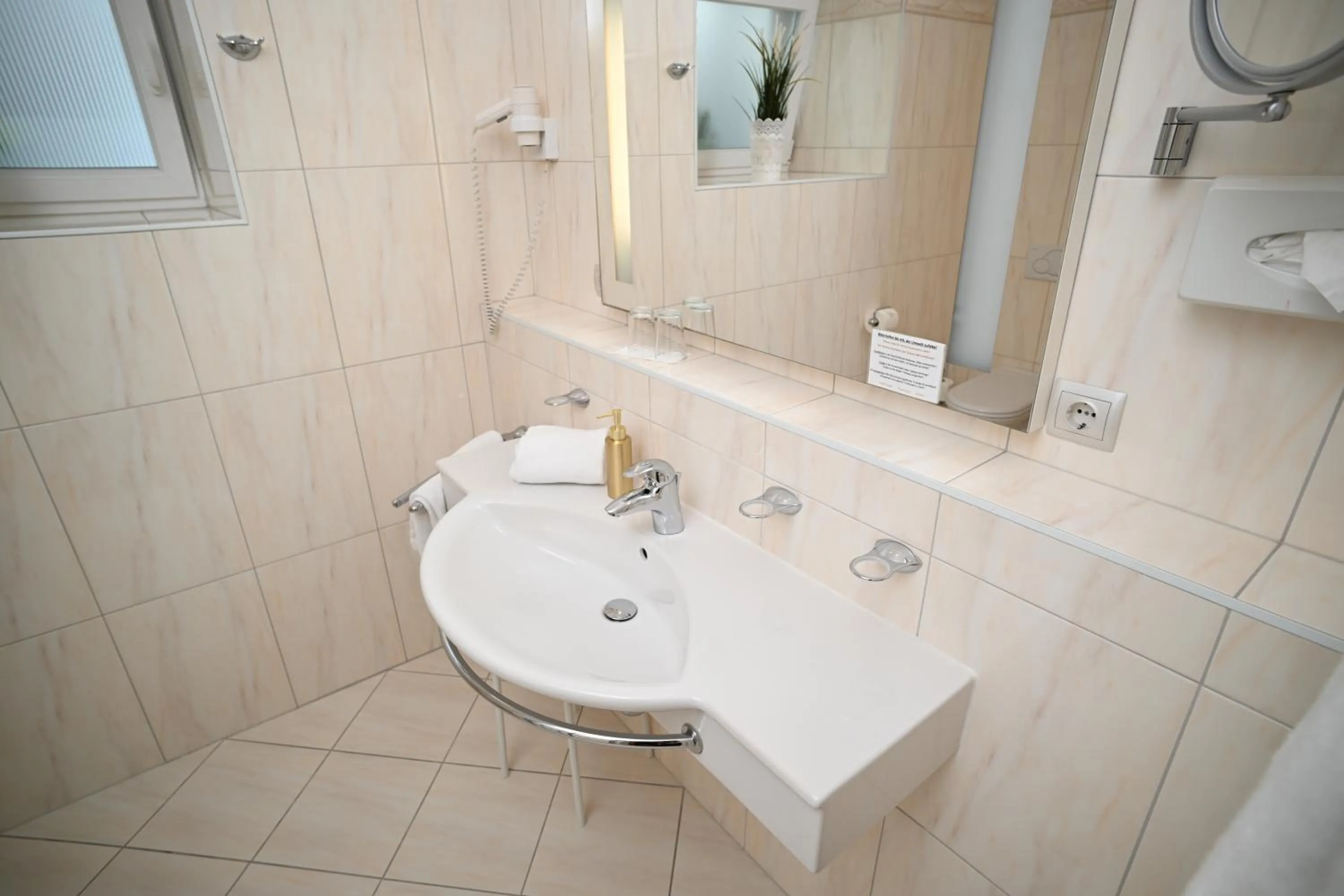 Bathroom in Boutique Hotel Goldenes Lamm Villach