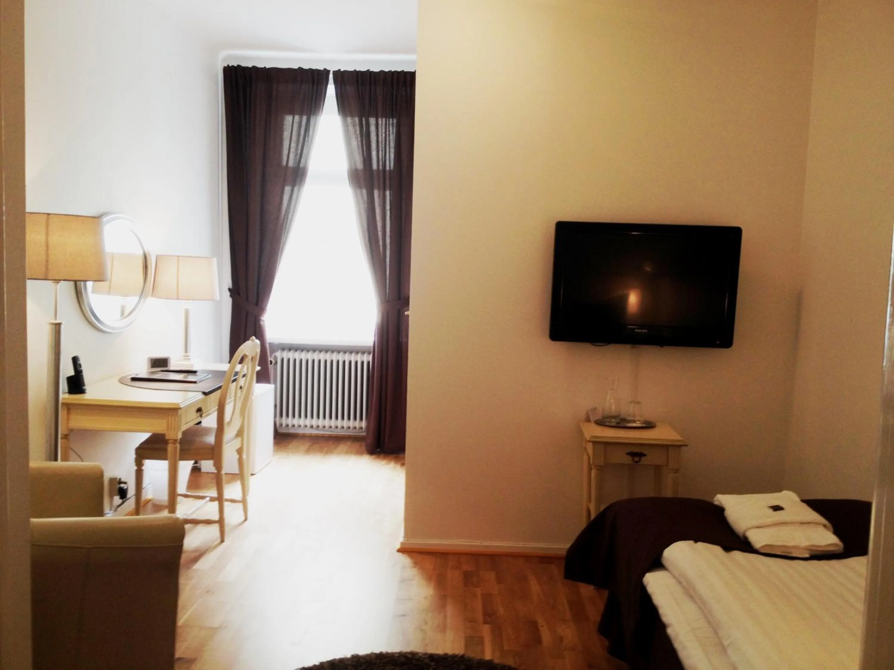 Bedroom, Bed in Stadshotellet Kristianstad