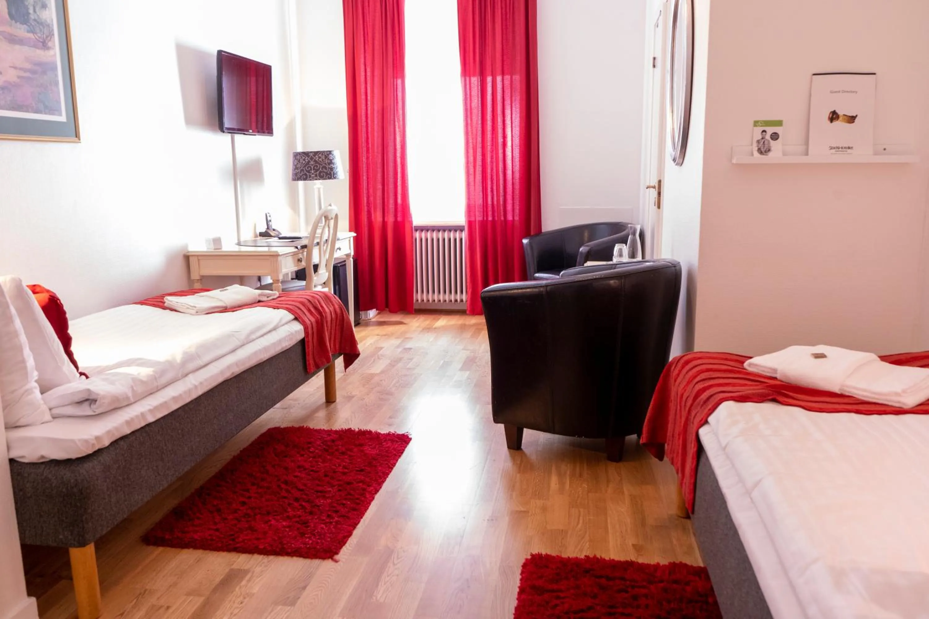 Photo of the whole room, Bed in Stadshotellet Kristianstad