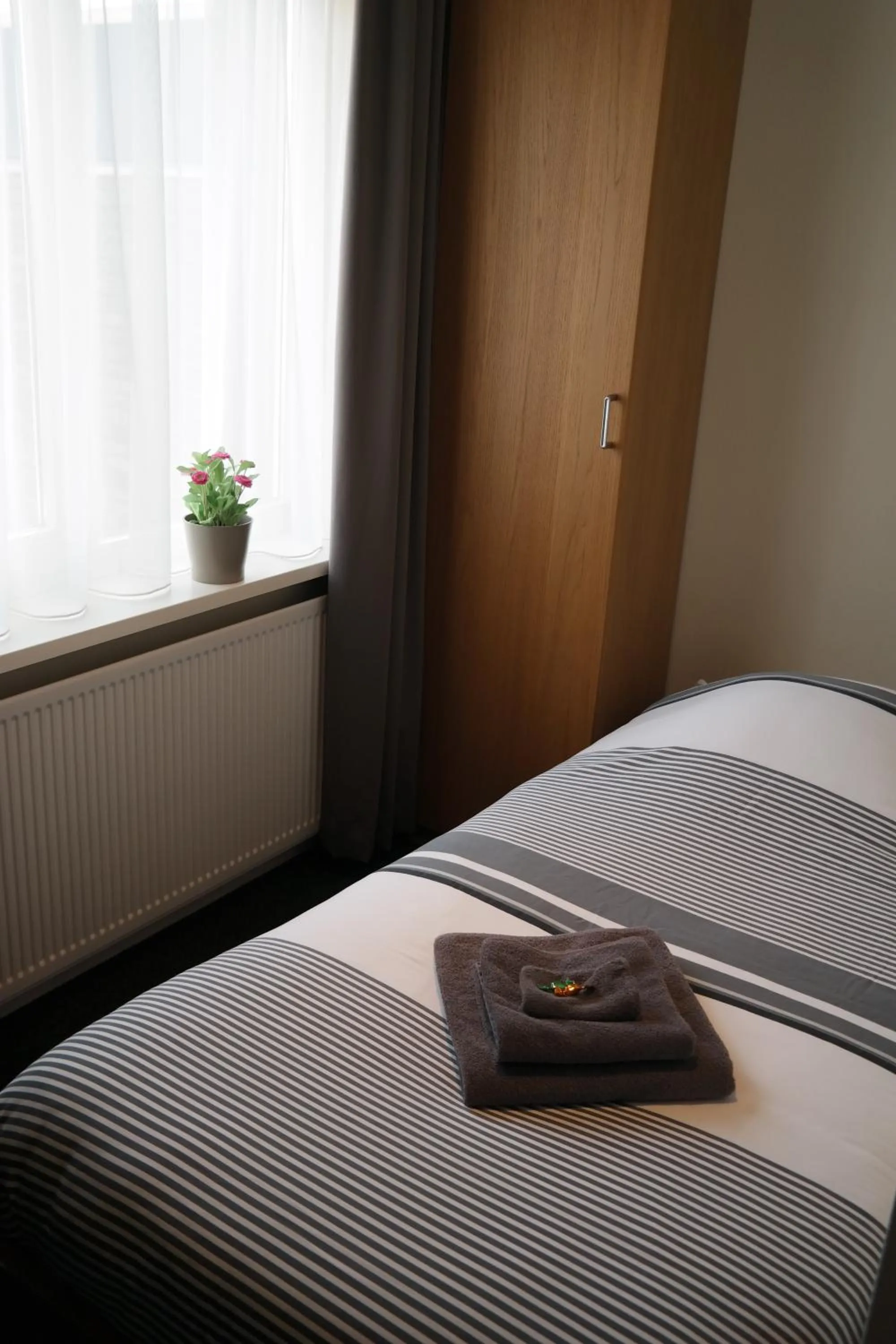 Bed in Hotel Rozenburg