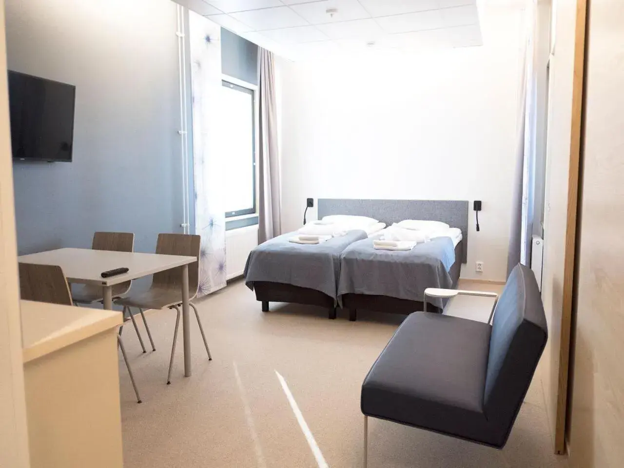 Superior Quadruple Room with Sauna in Santasport Resort Superior Quadruple Room with Sauna in Santasport Resort