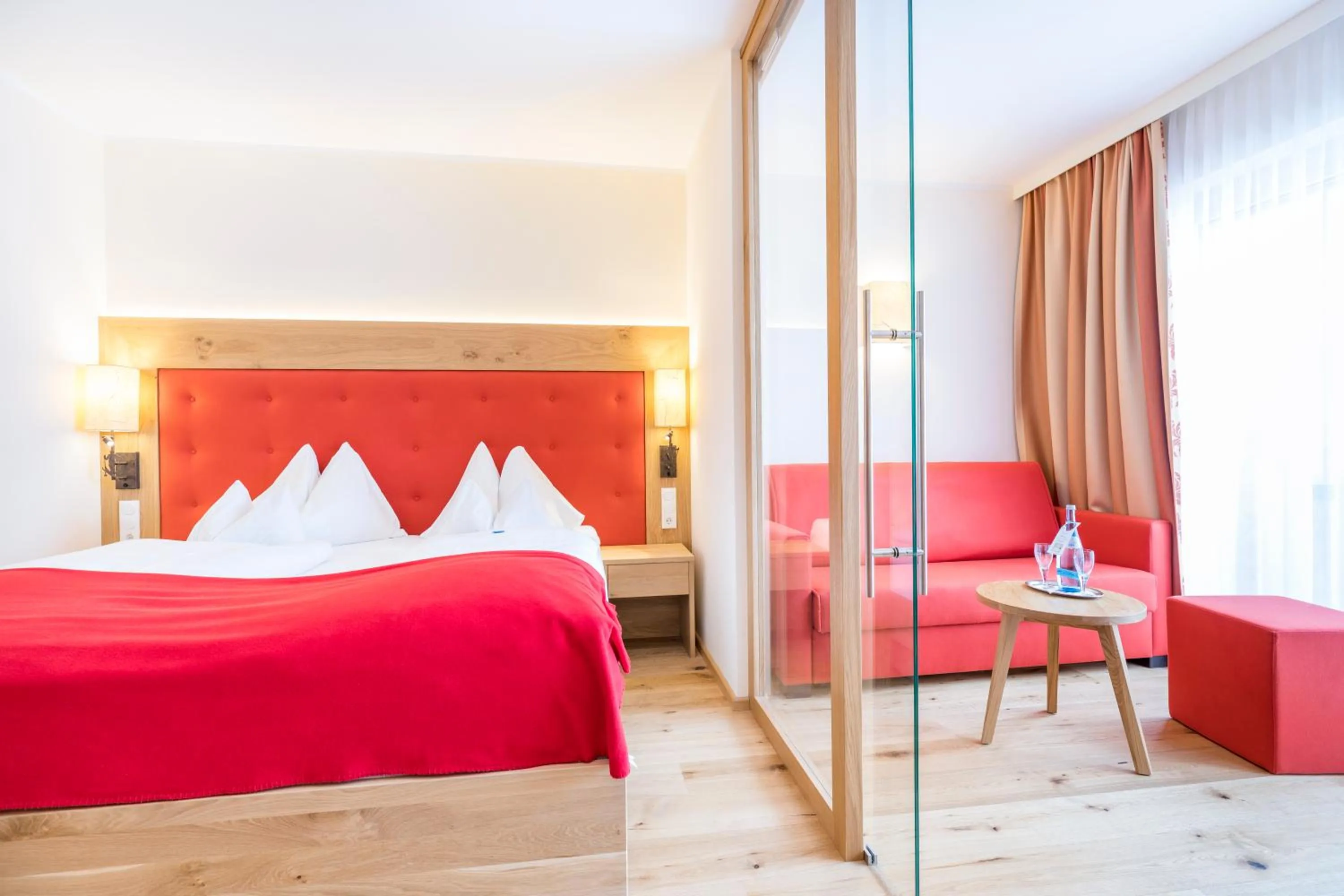 Bed in Hotel Alpenland