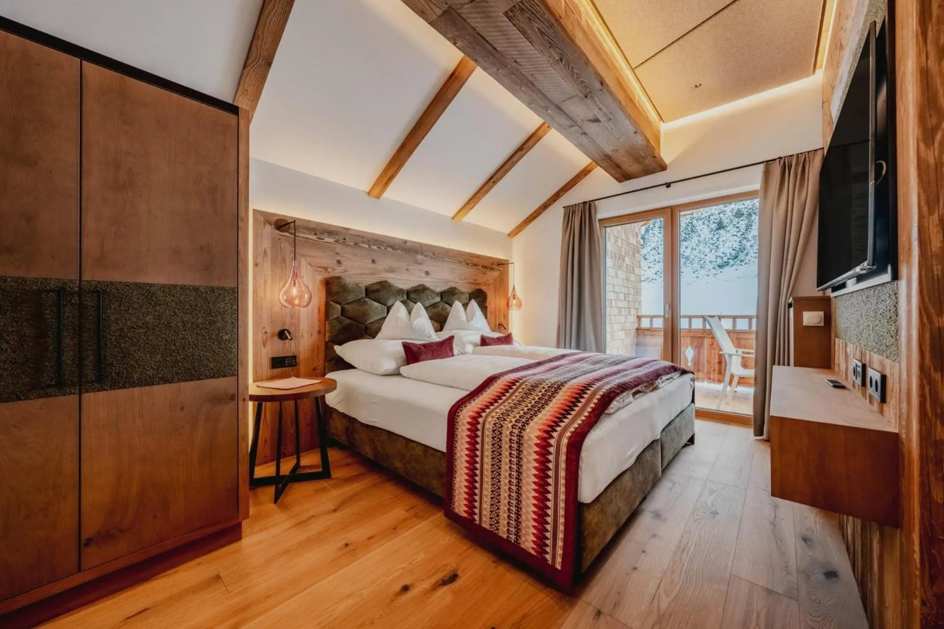 Bed in Alpenromantik-Hotel Wirlerhof