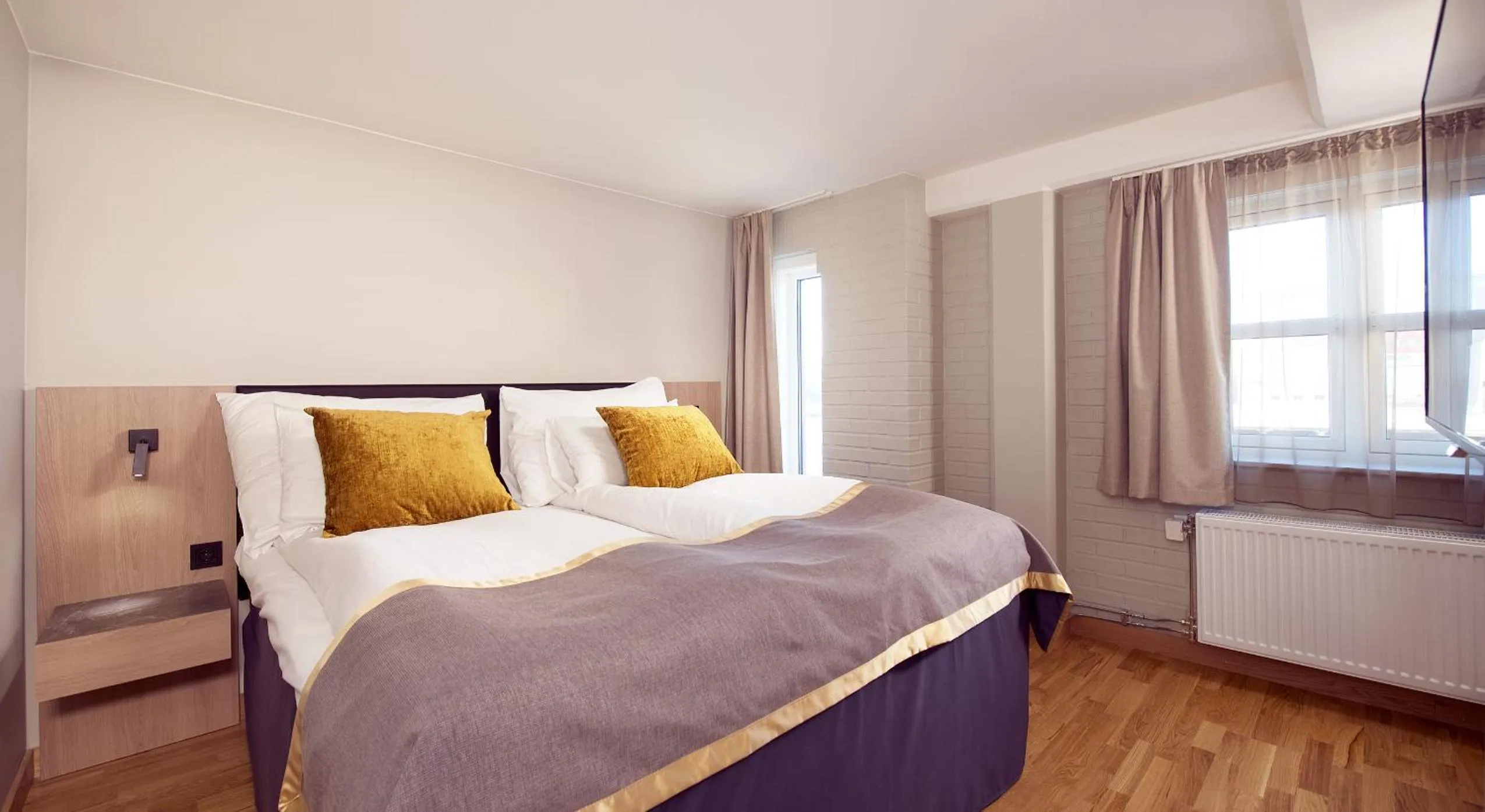 Bed in Clarion Collection Hotel Bryggeparken