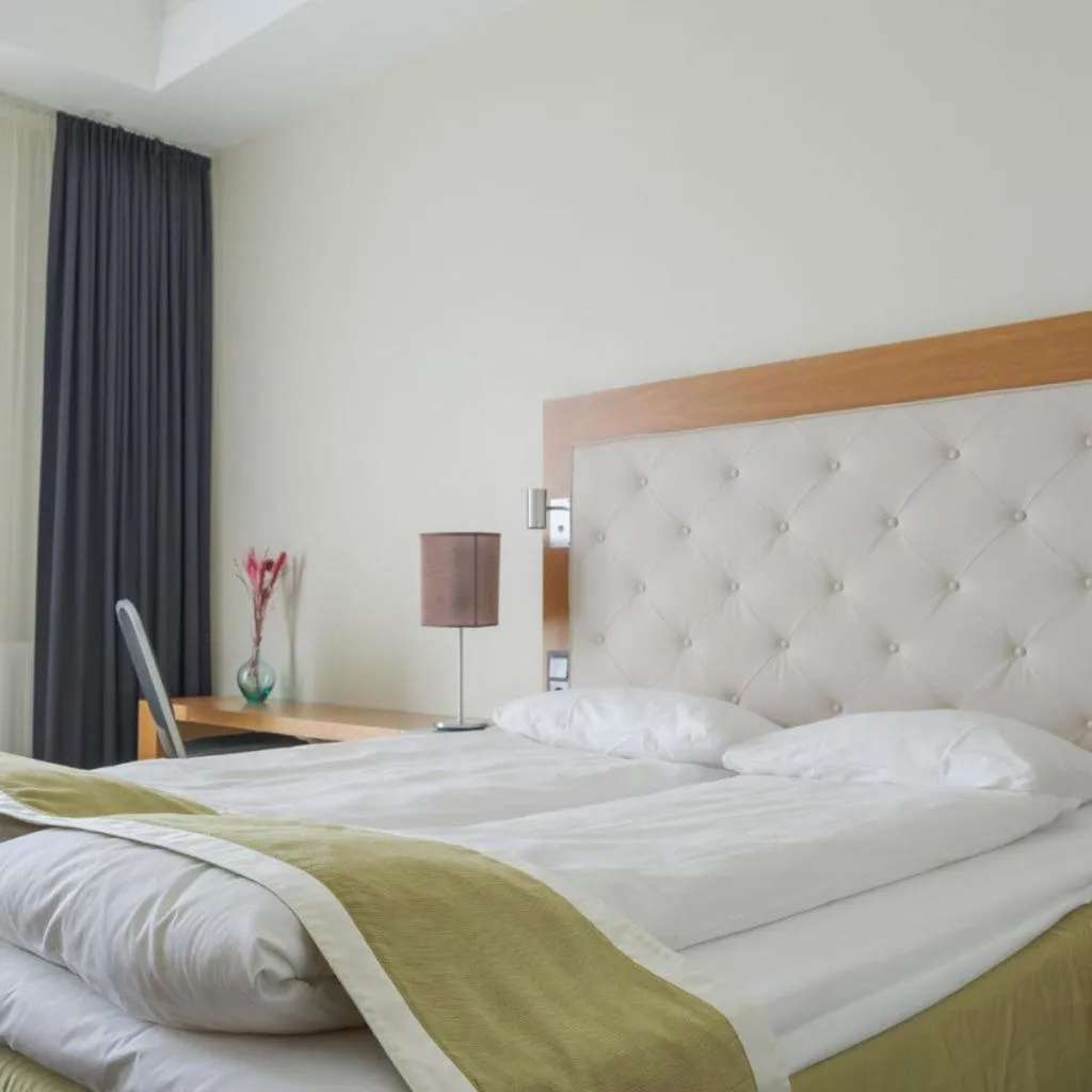 Bed in Utsikten Hotell Kvinesdal - Unike Hoteller