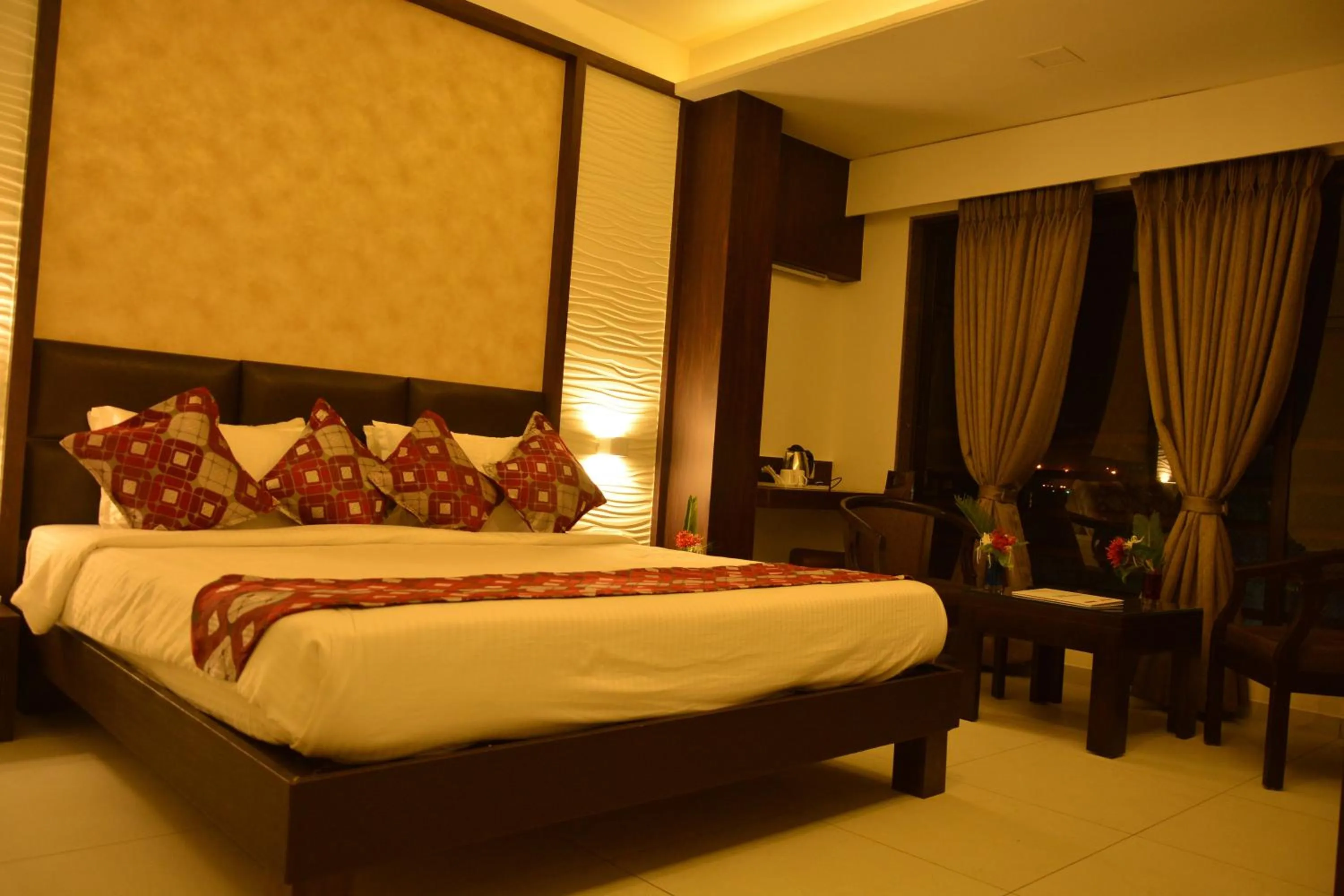 Bed in The Divine Resort Somnath