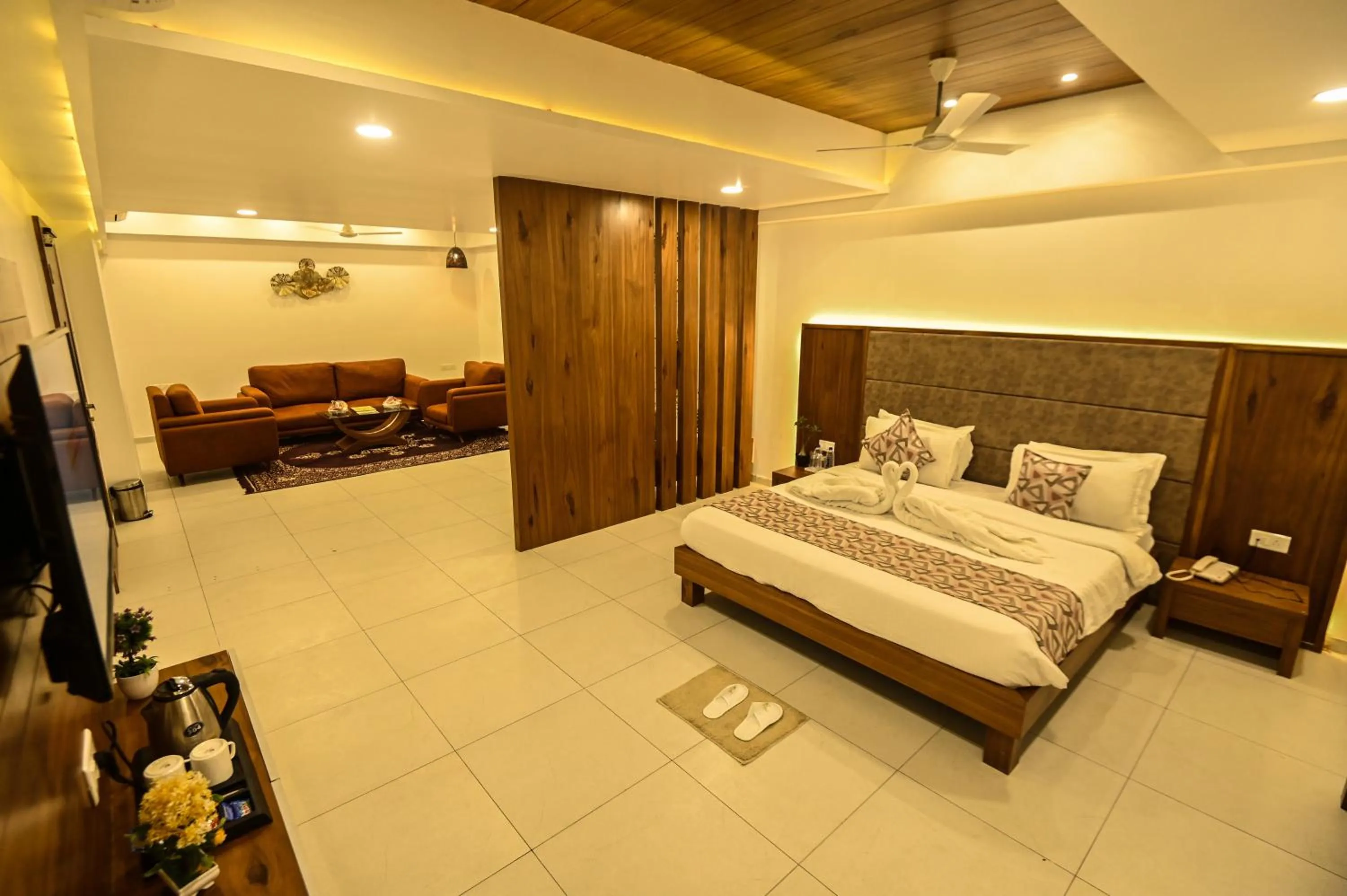 Photo of the whole room, Bed in The Divine Resort Somnath