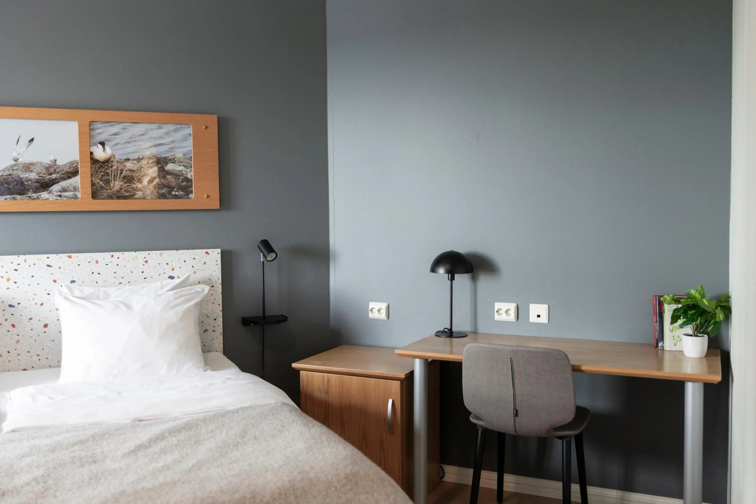 Bed in Home Hotel Grimstad