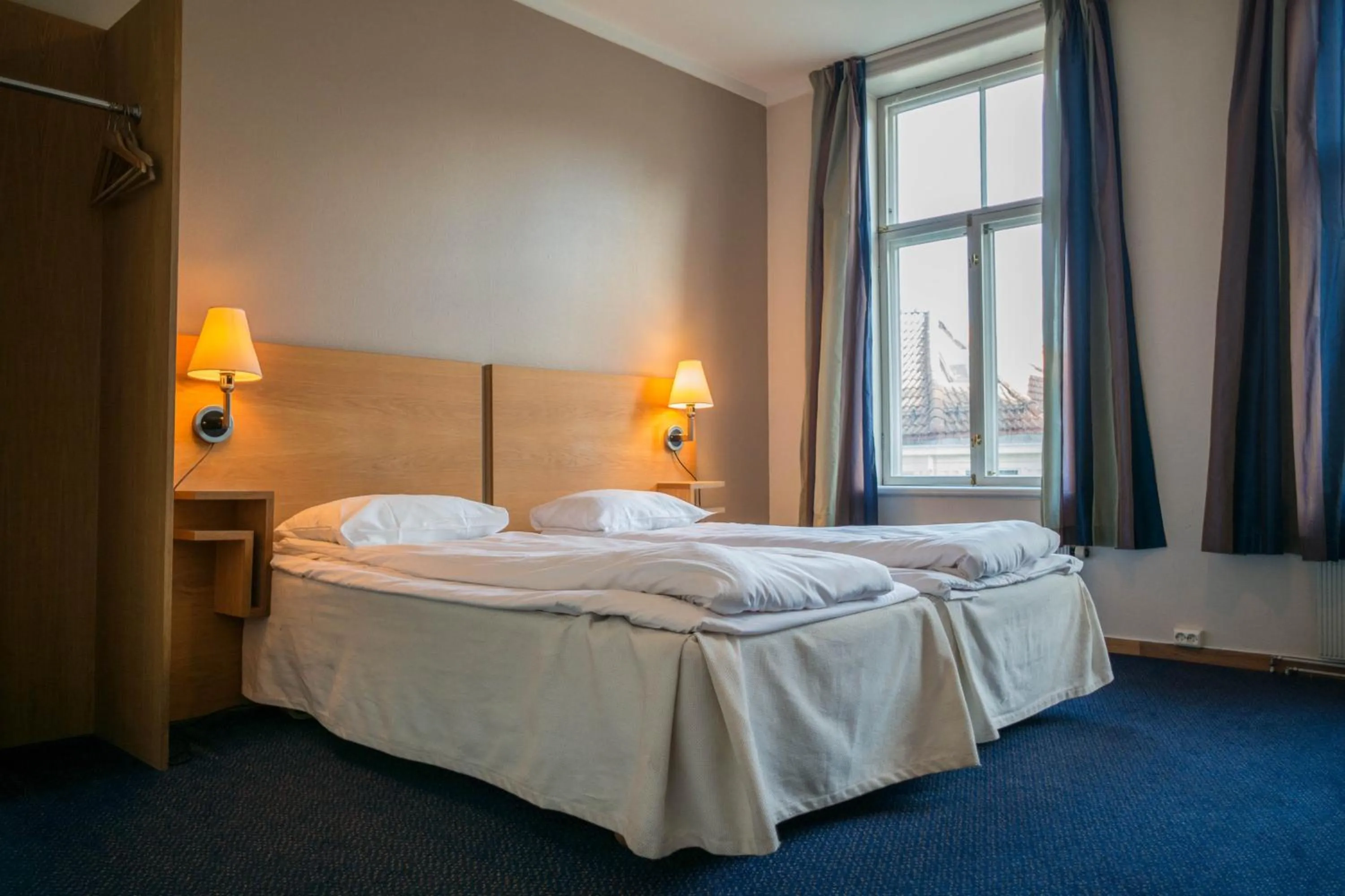 Bed in City Living Schøller Hotel