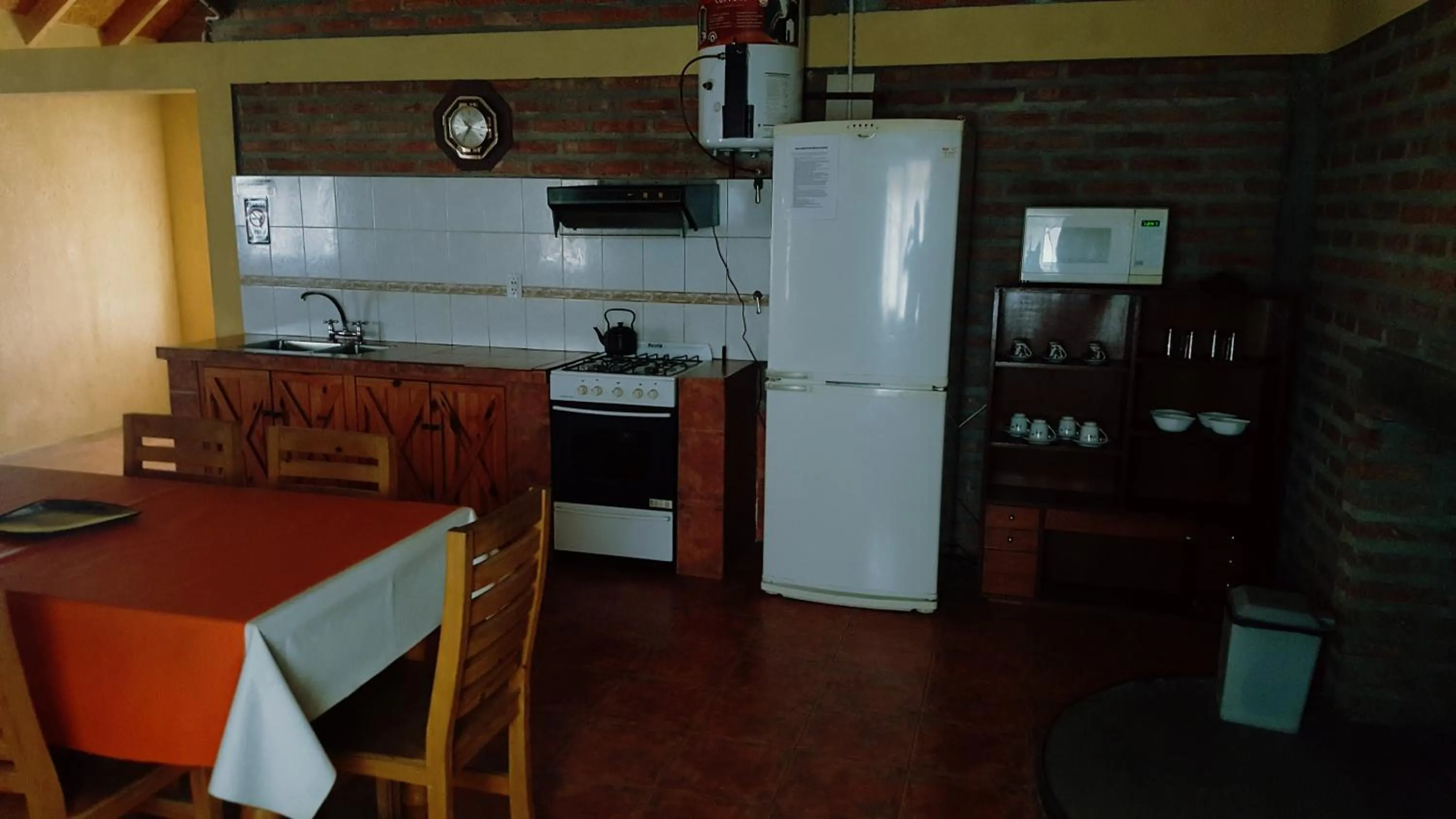 Kitchen or kitchenette in Cabañas Paihuen