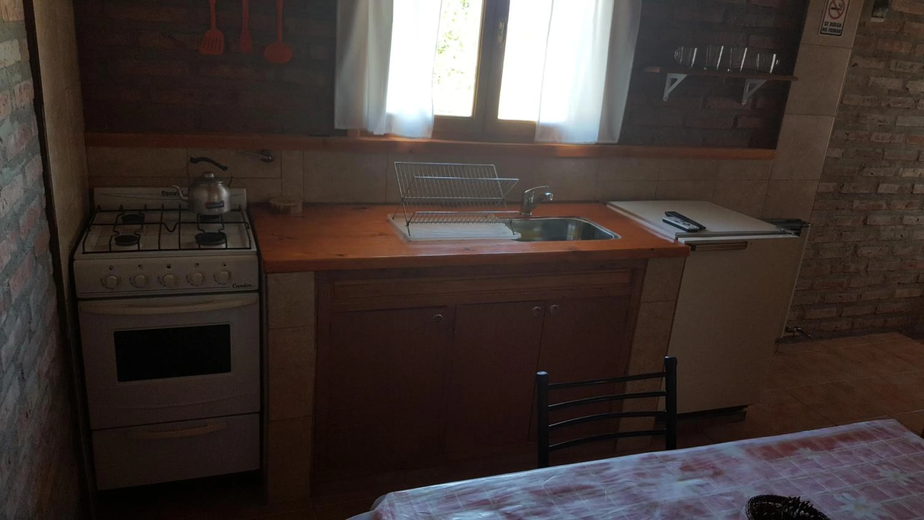 Kitchen or kitchenette in Cabañas Paihuen