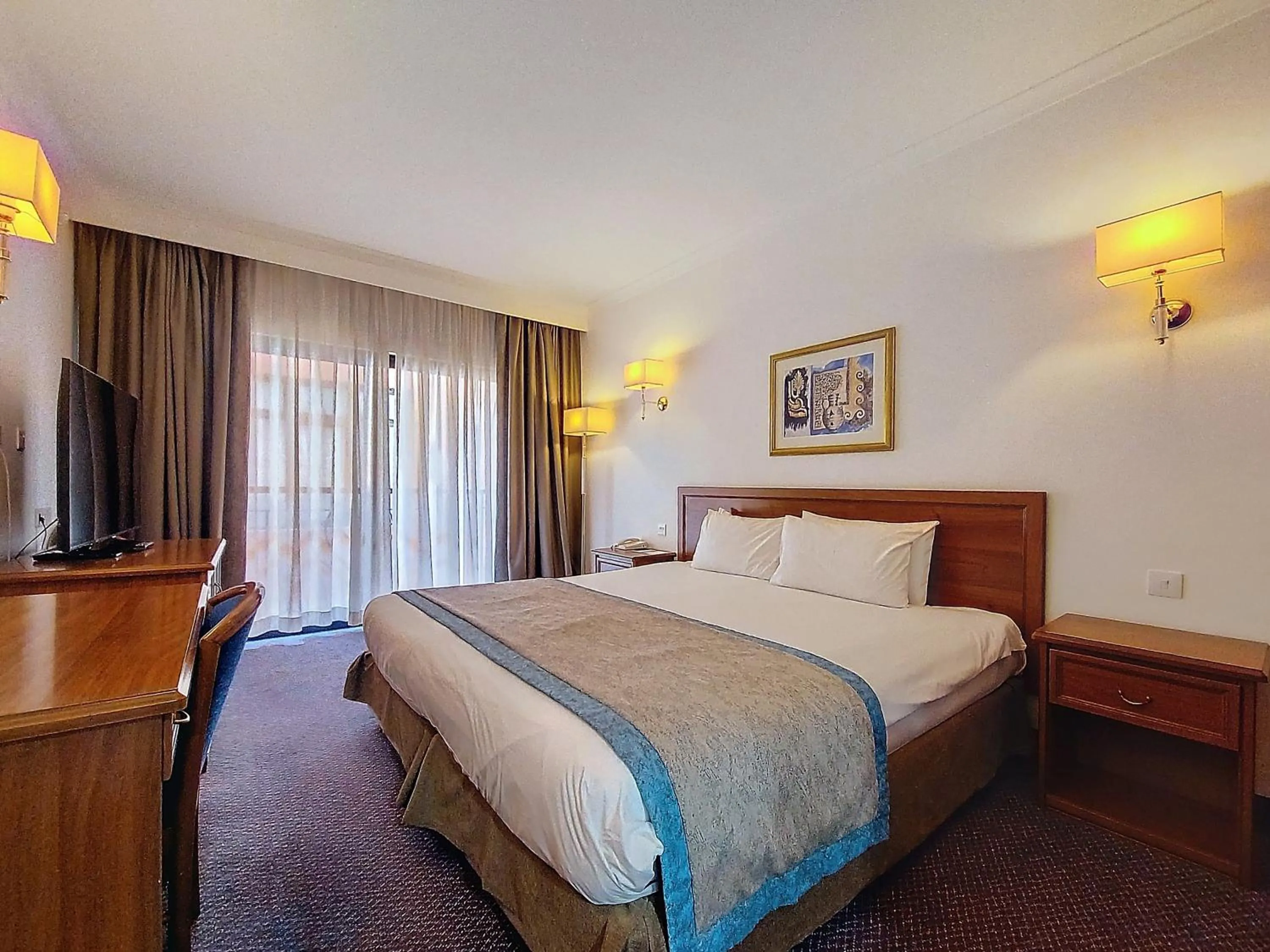 Bed in Vivaldi Hotel