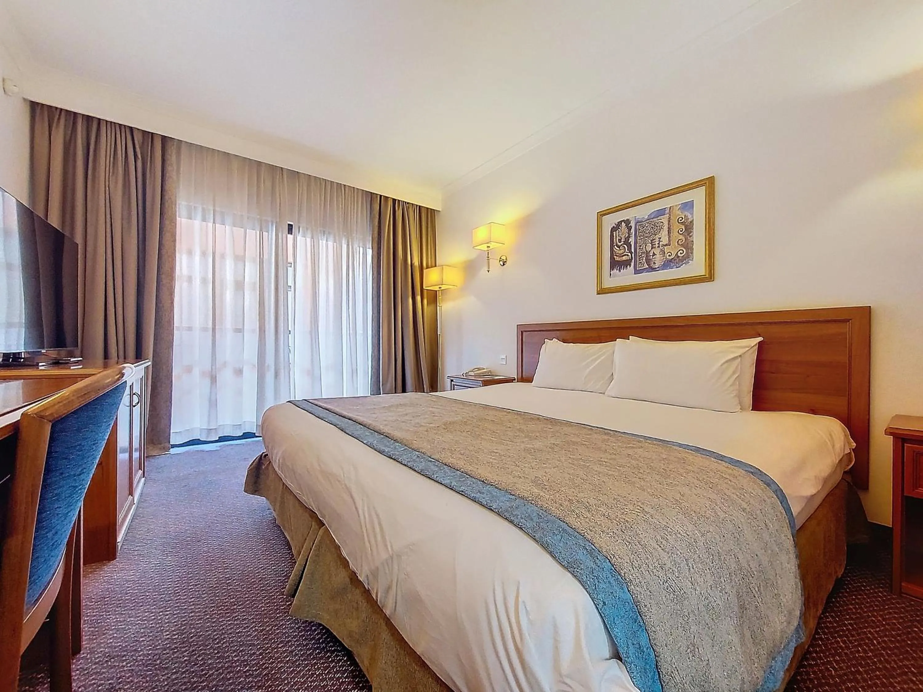 Bed in Vivaldi Hotel