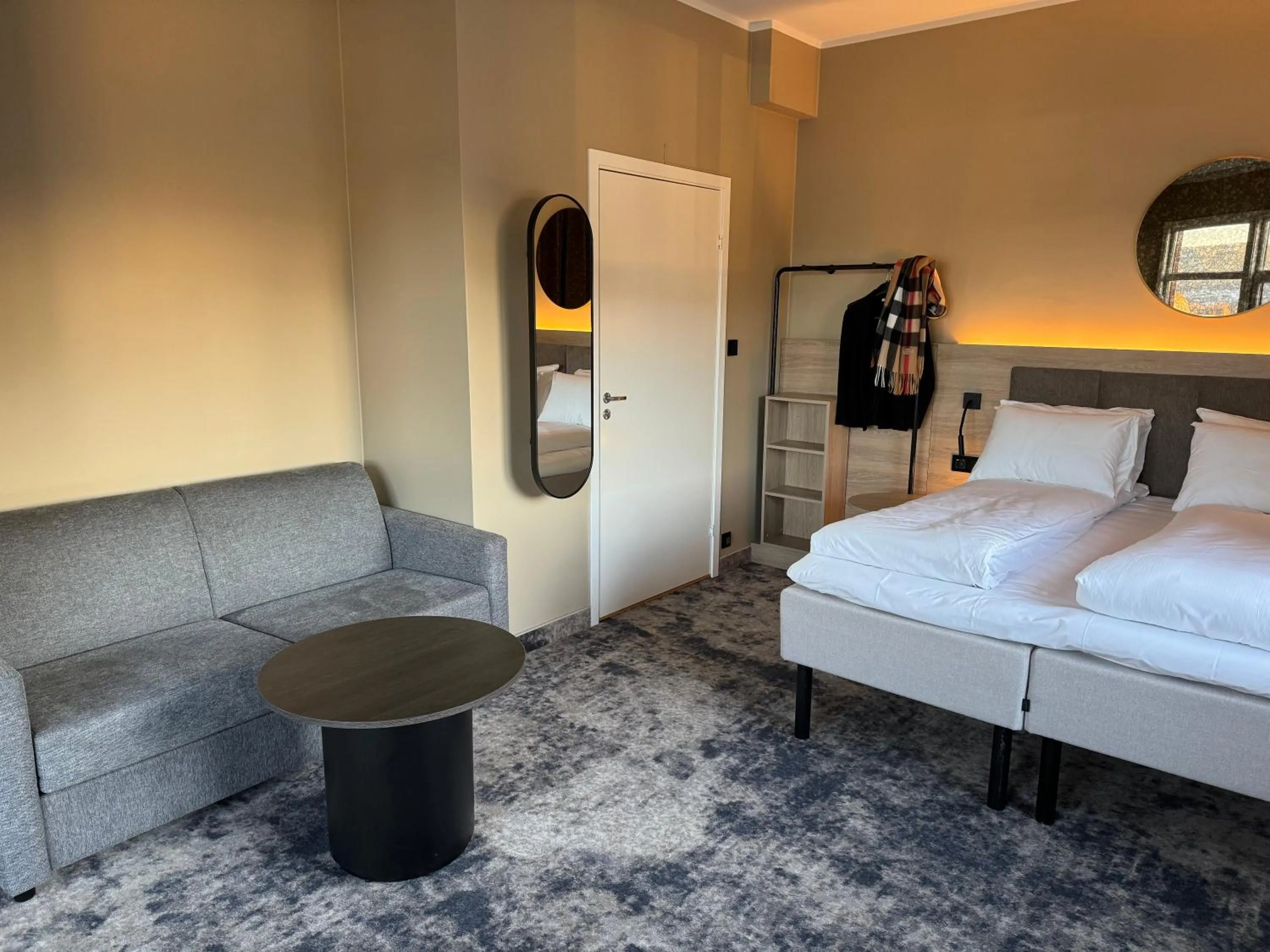 Seating area, Bed in Notodden Hotel