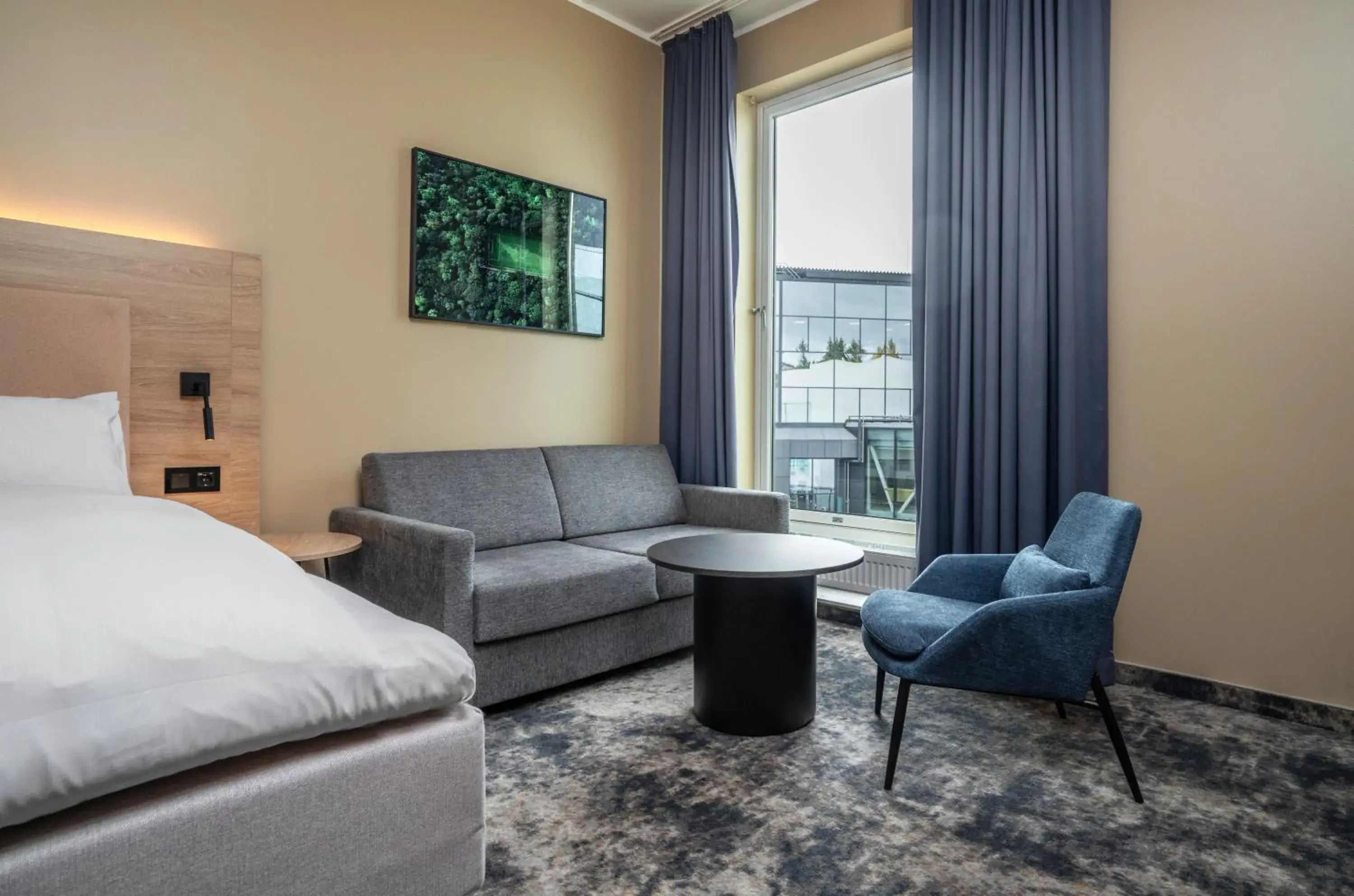 Seating area, Bed in Thon Partner Hotel Ullevaal Stadion Seating area, Bed in Thon Partner Hotel Ullevaal Stadion