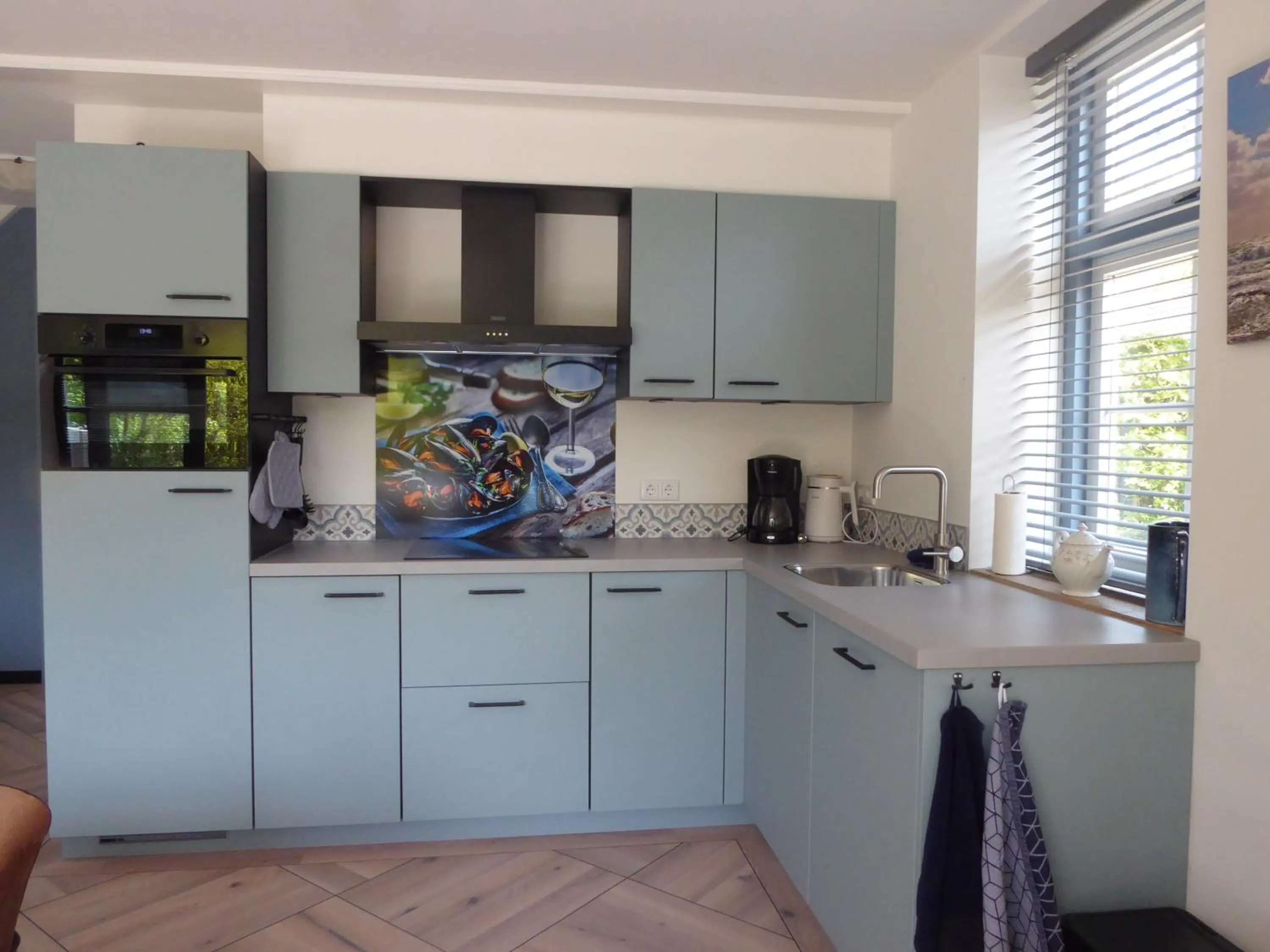 Kitchen or kitchenette in Gastenverblijf Neeltje