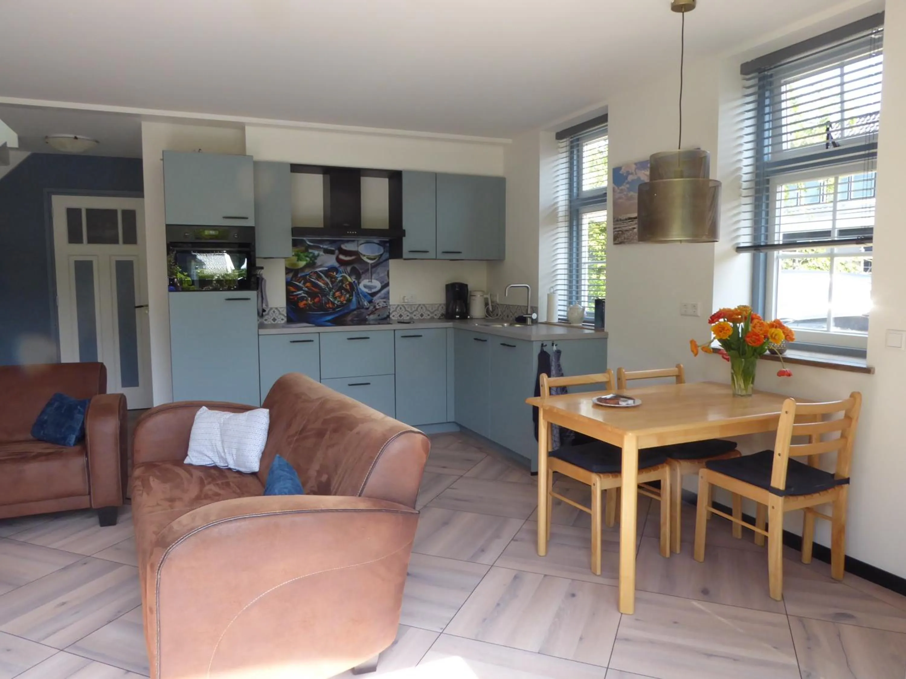 Kitchen or kitchenette in Gastenverblijf Neeltje