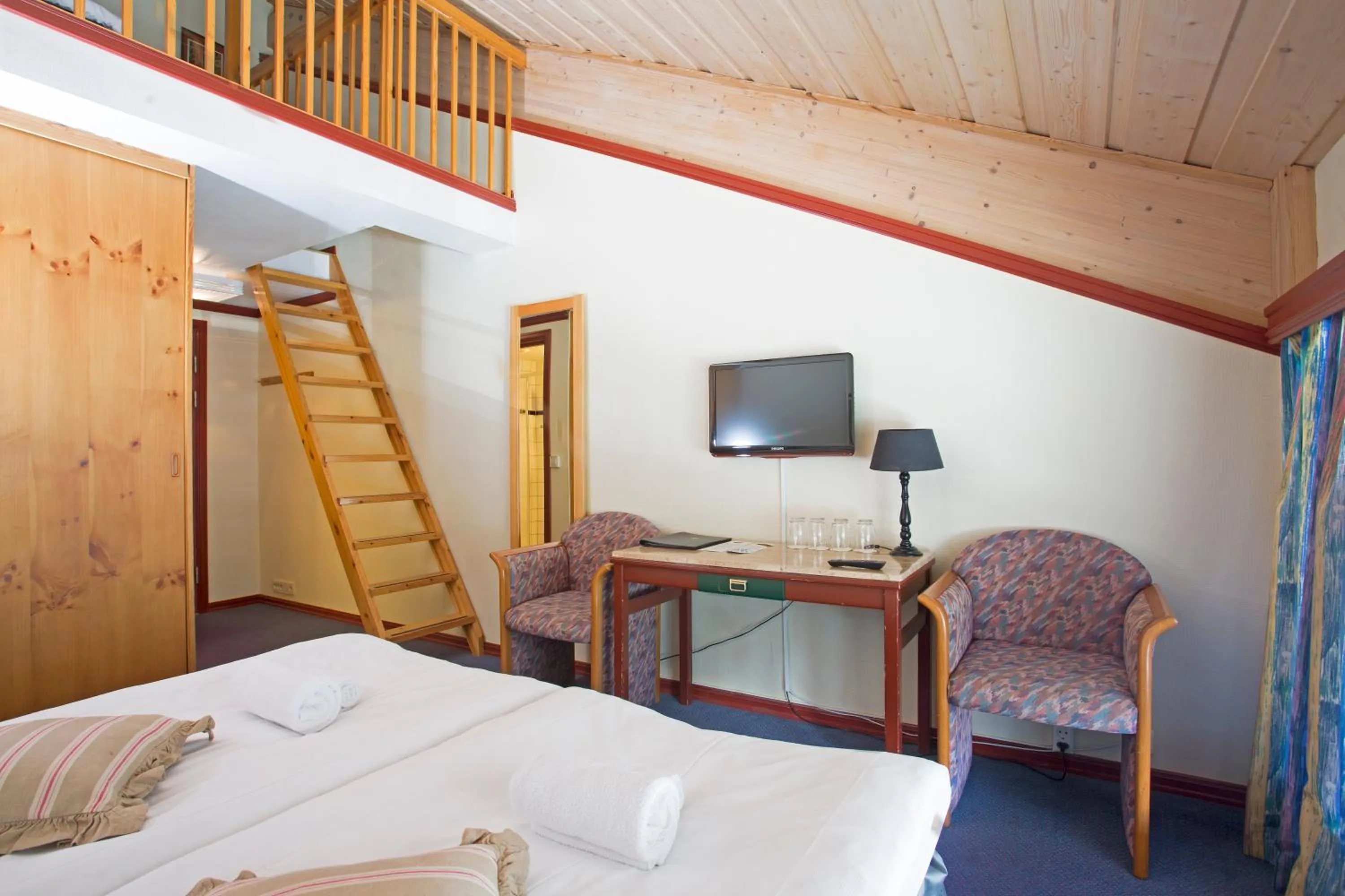 Photo of the whole room, Bed in Skogstad Hotel - Unike Hoteller