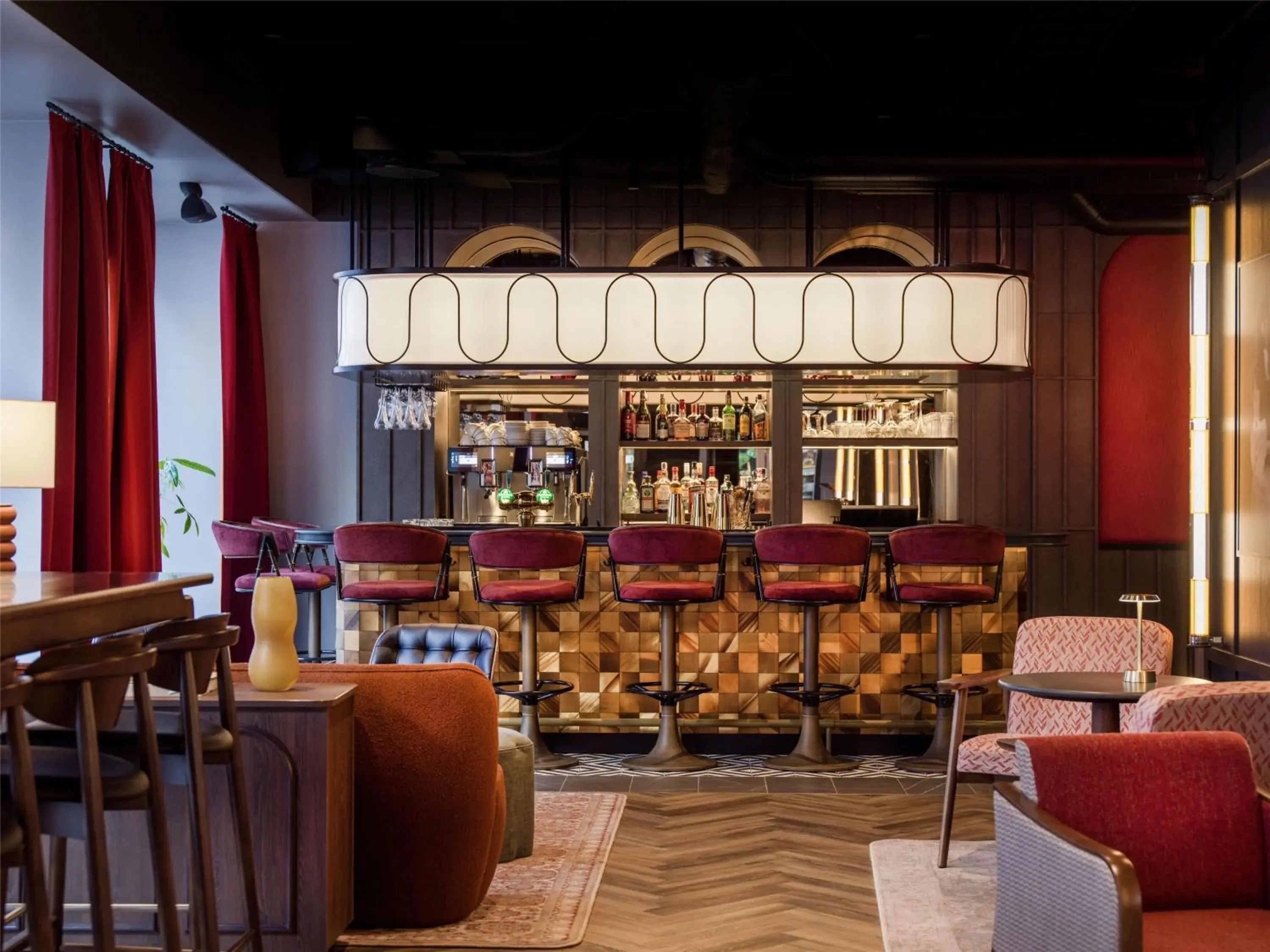 Lounge or bar in Radisson RED Oslo City Centre, A Verified Net Zero Hotel Lounge or bar in Radisson RED Oslo City Centre, A Verified Net Zero Hotel