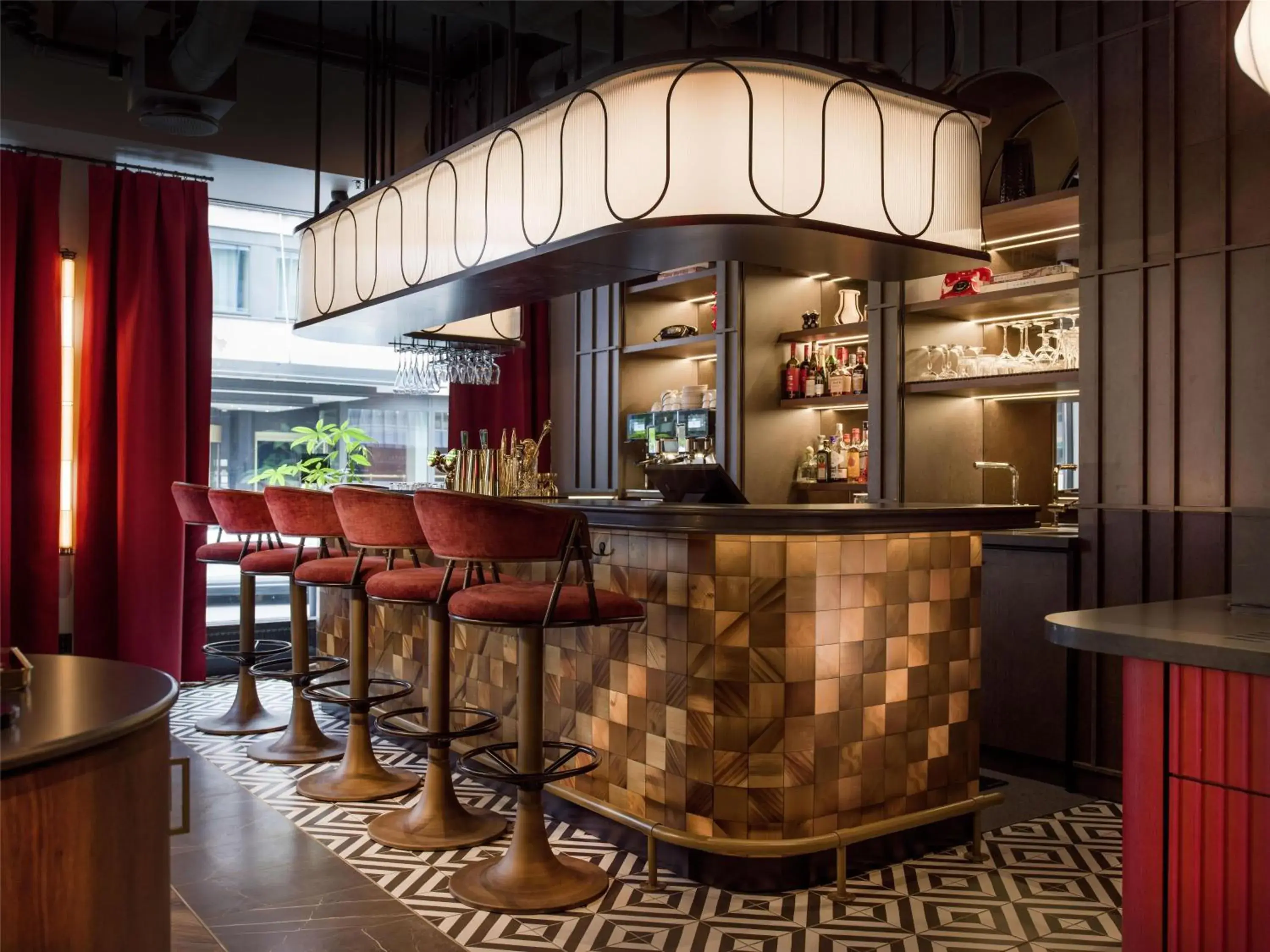 Lounge or bar in Radisson RED Oslo City Centre, A Verified Net Zero Hotel Lounge or bar in Radisson RED Oslo City Centre, A Verified Net Zero Hotel