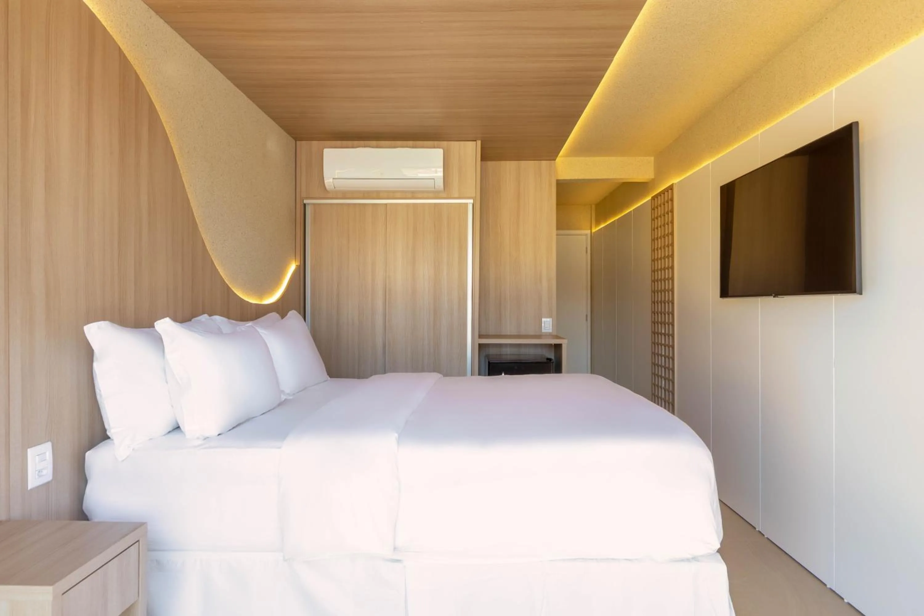 Bed in Pousada Estrela de Paraty