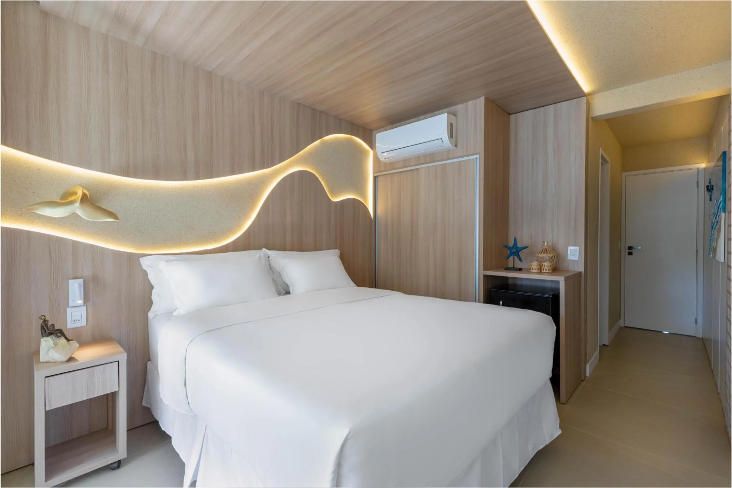 Bed in Pousada Estrela de Paraty