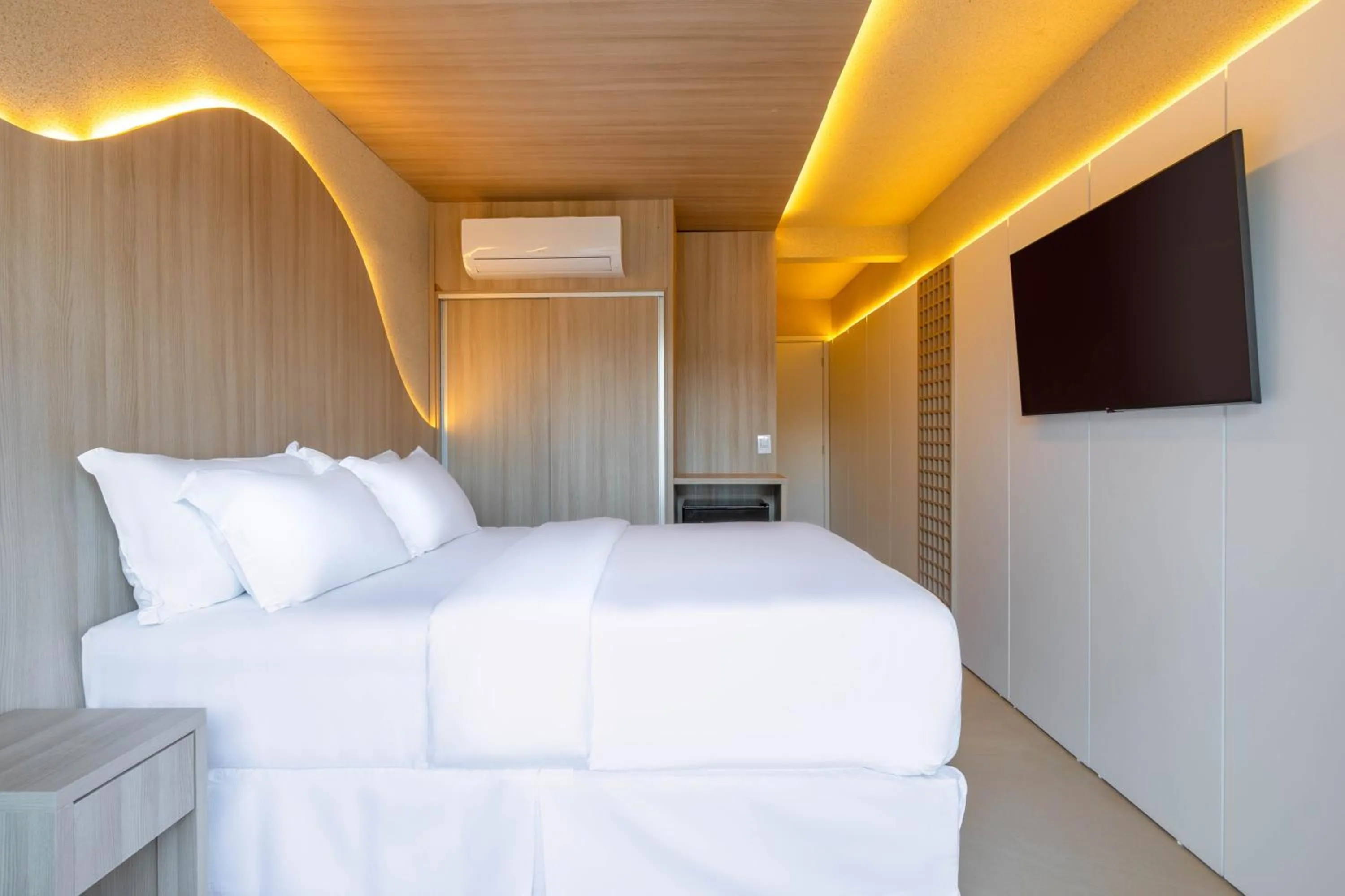 Bed in Pousada Estrela de Paraty