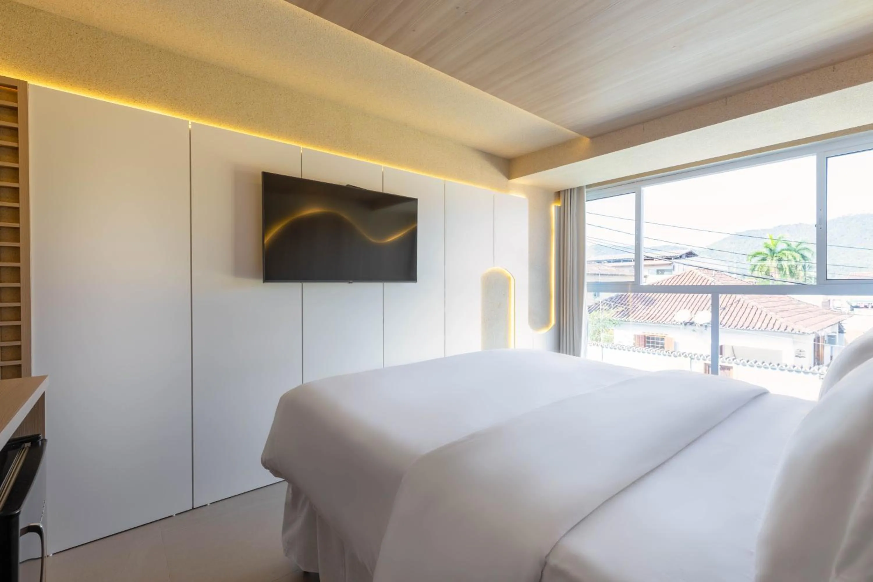 Bed in Pousada Estrela de Paraty