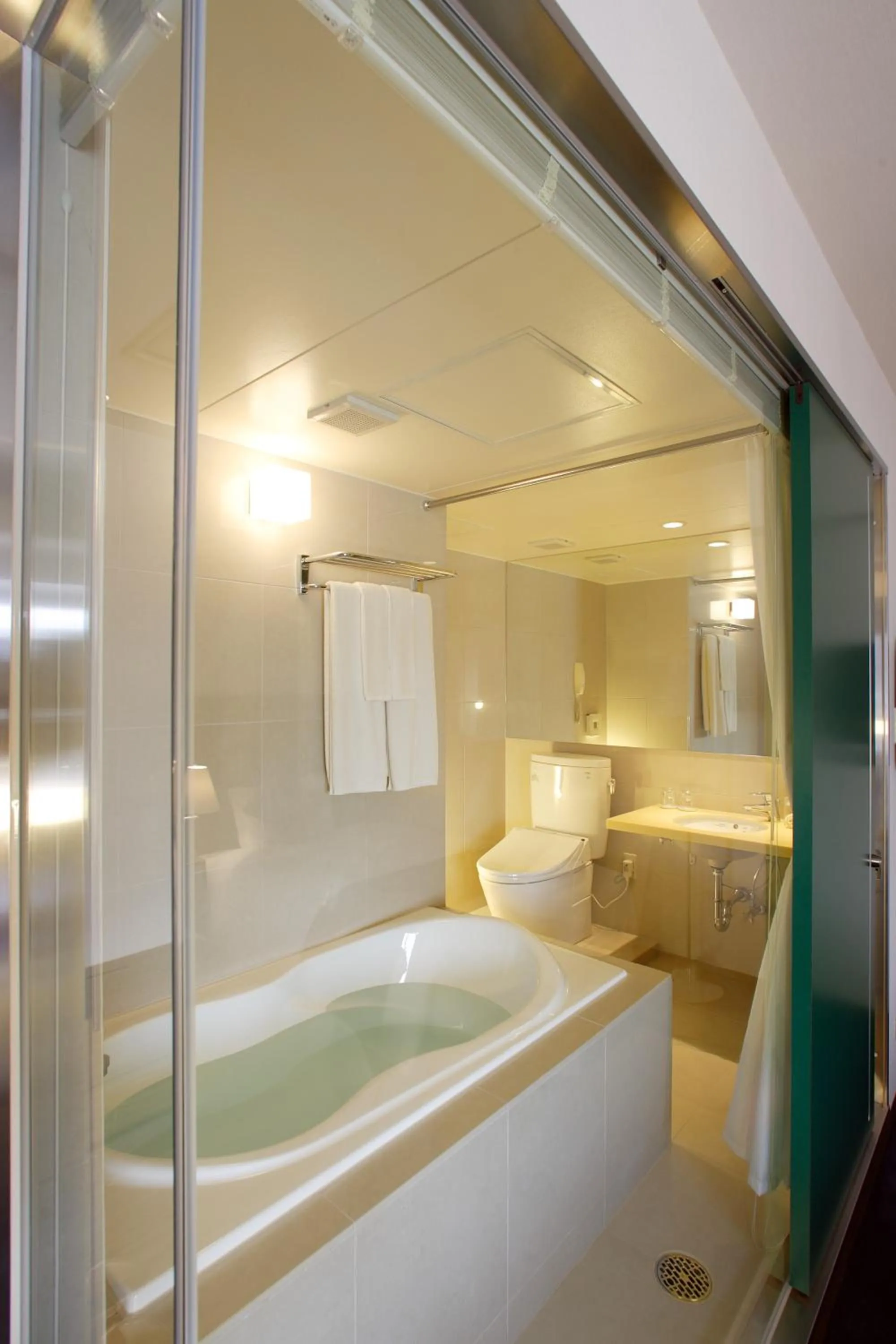 Bathroom, Bed in Oriental Hotel Hiroshima