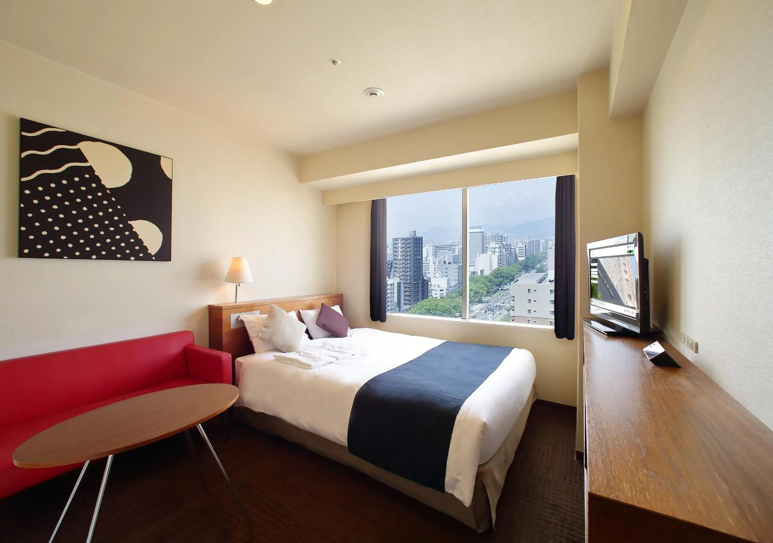 Photo of the whole room, Bed in Oriental Hotel Hiroshima