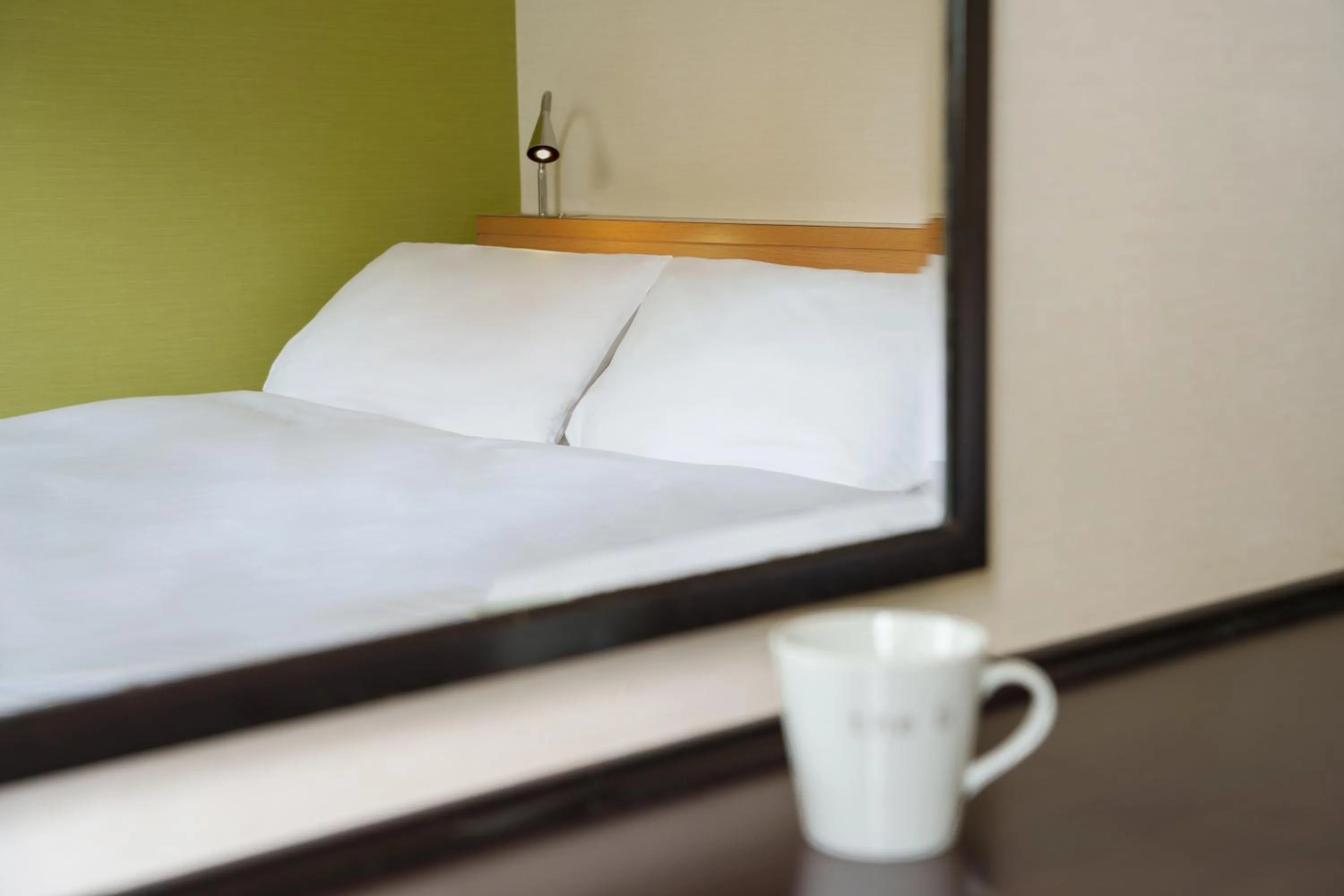 Photo of the whole room, Bed in the b hakata