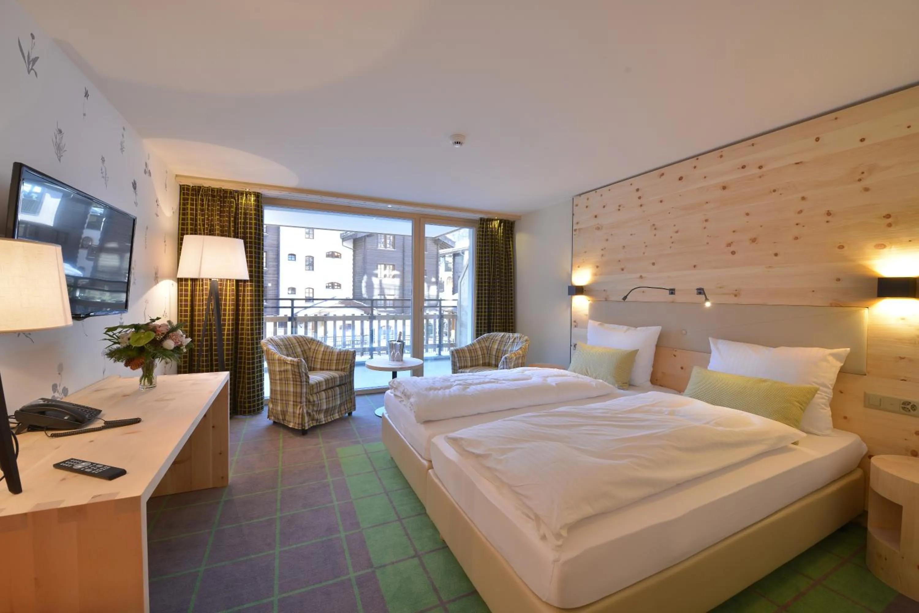 Bed in Alpenhotel Fleurs de Zermatt