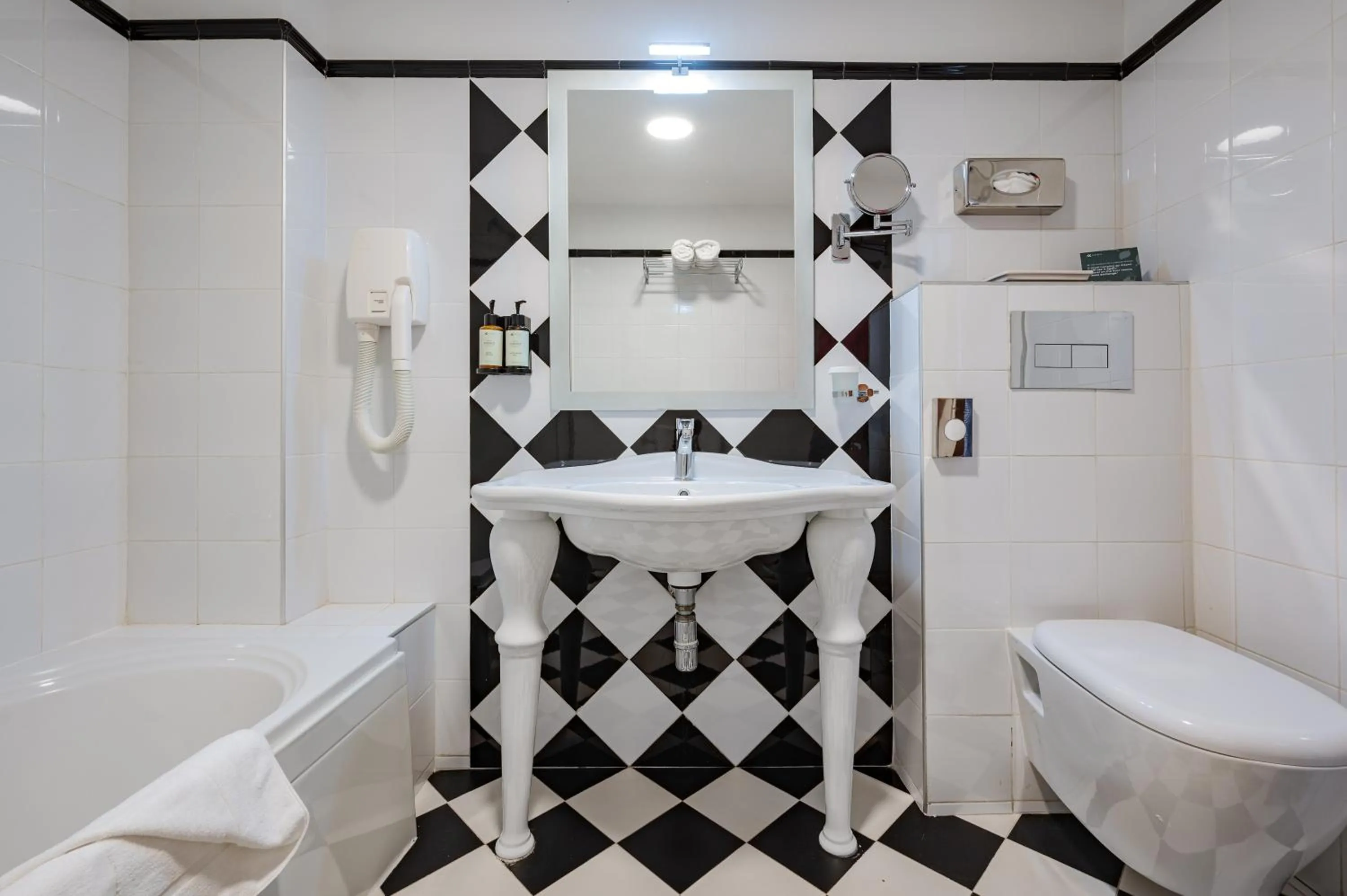 Bathroom in AX The Victoria Hotel