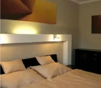 Bed in Hotel Galileo