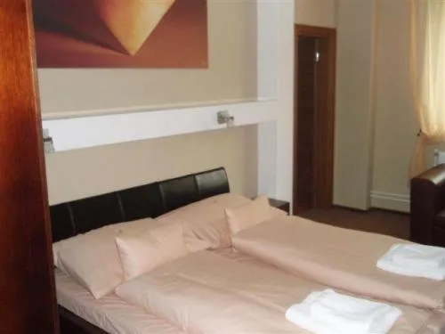 Bed in Hotel Galileo