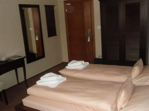 Bed in Hotel Galileo