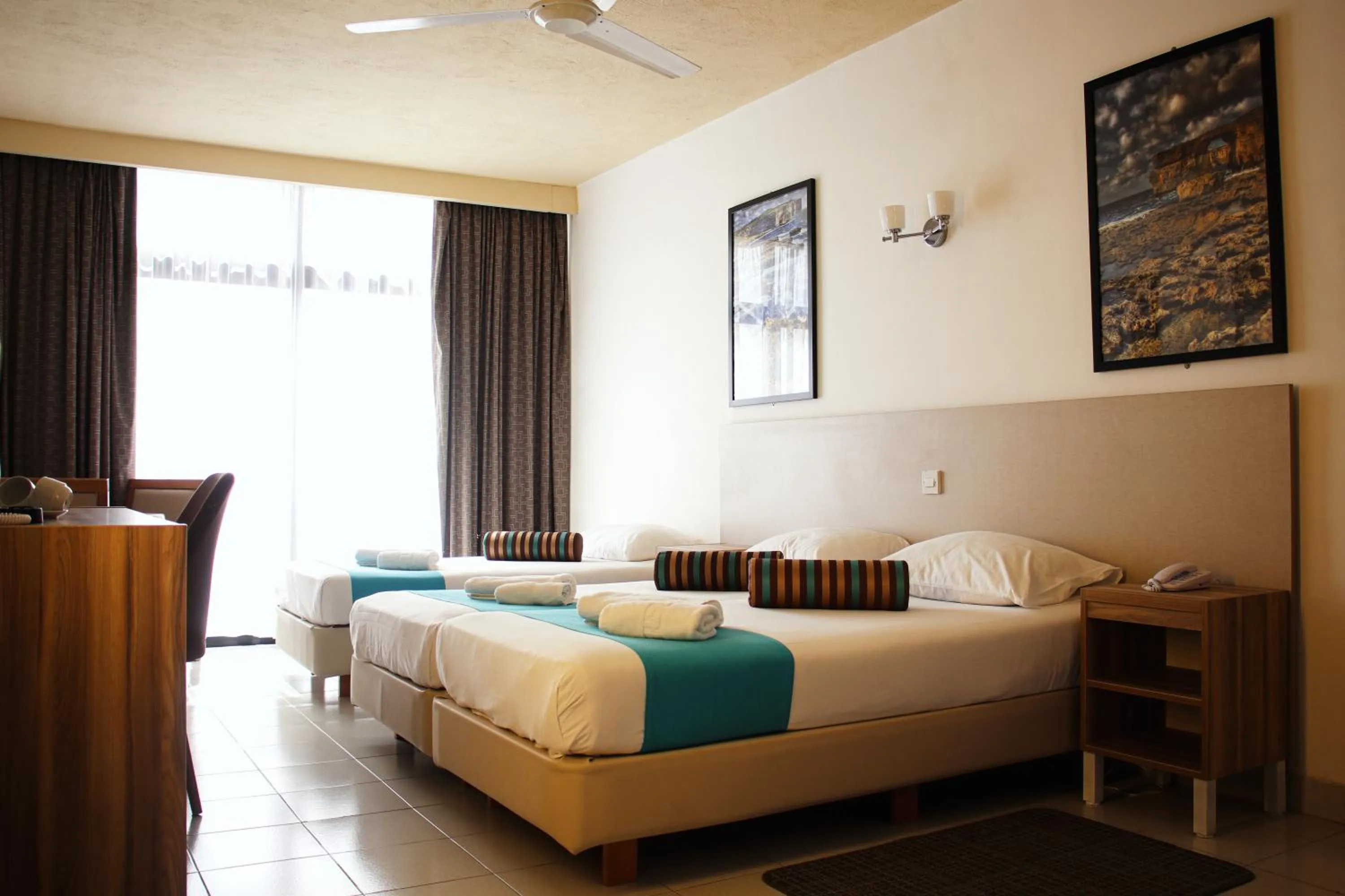 Bed in Canifor Hotel