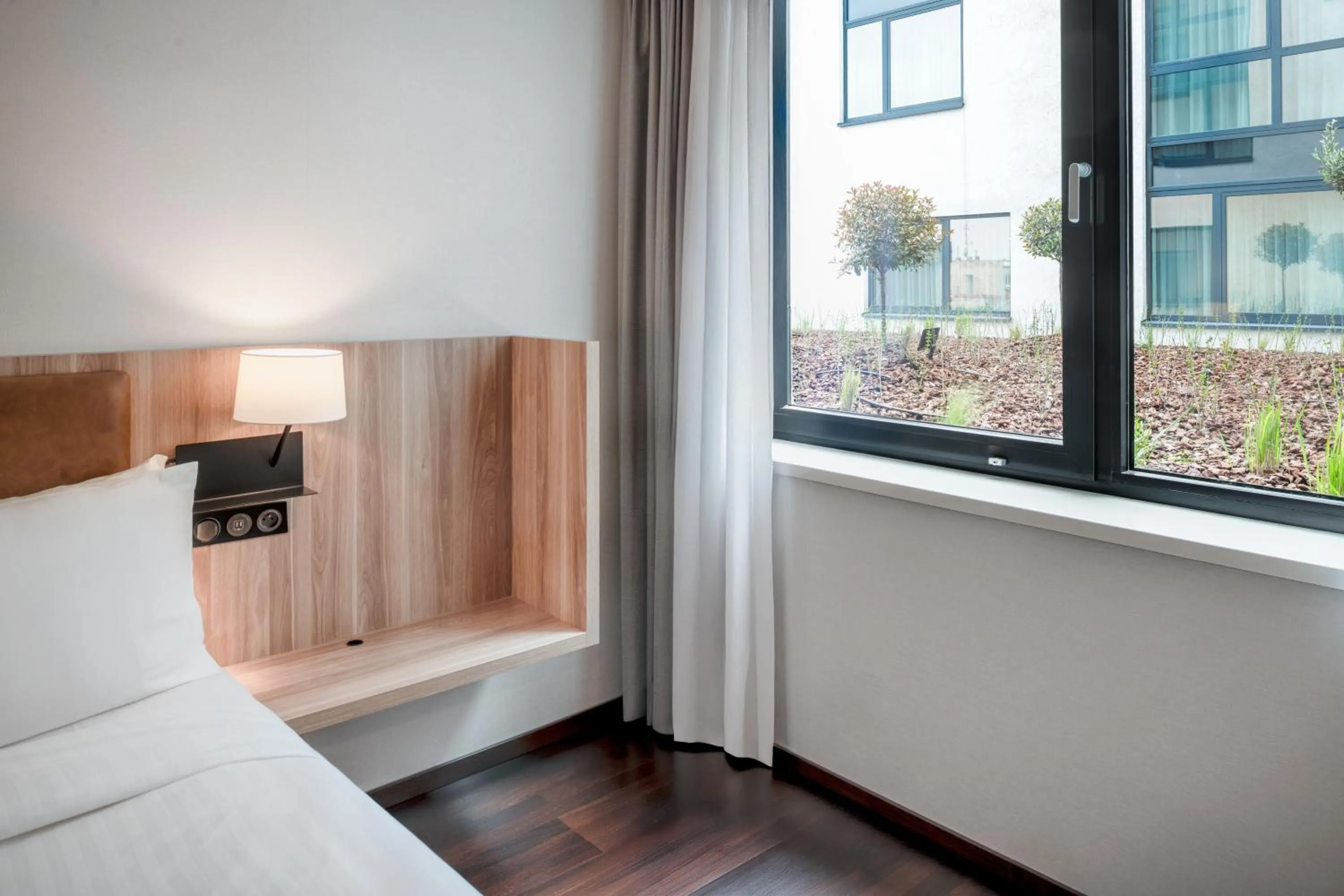 Garden view, Bed in AC Hotel by Marriott Bratislava Old Town