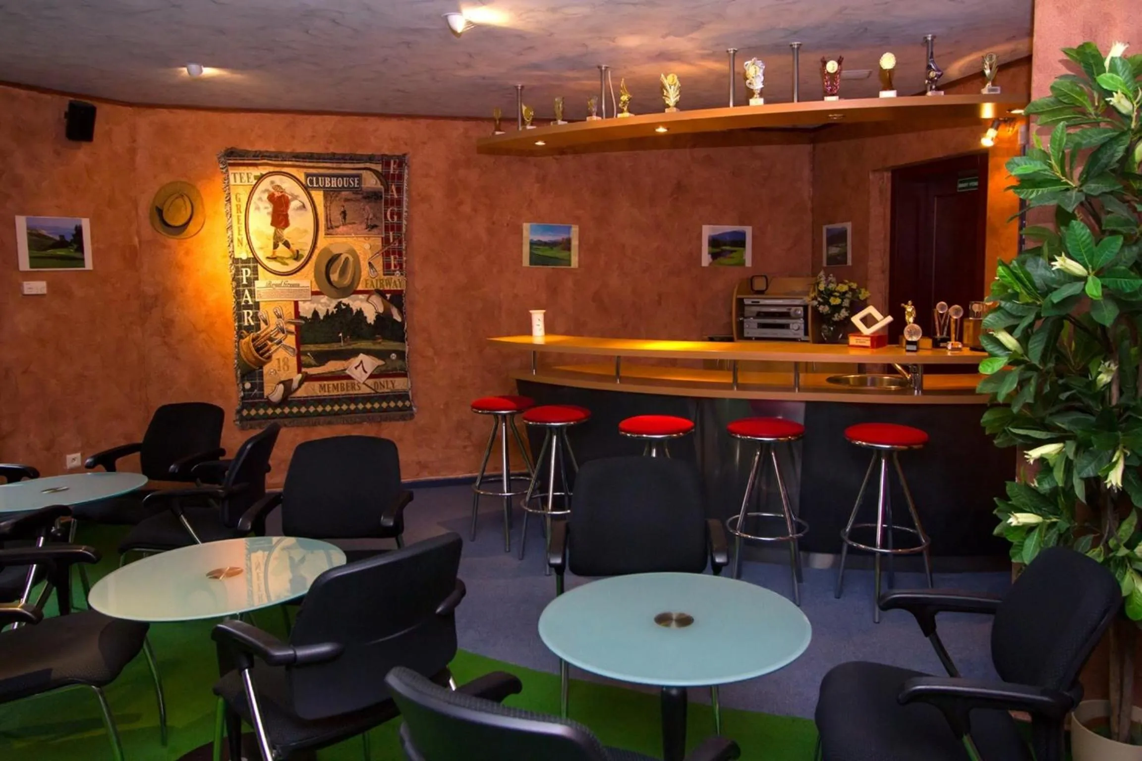 Communal lounge/ TV room in Hotel GOLFER