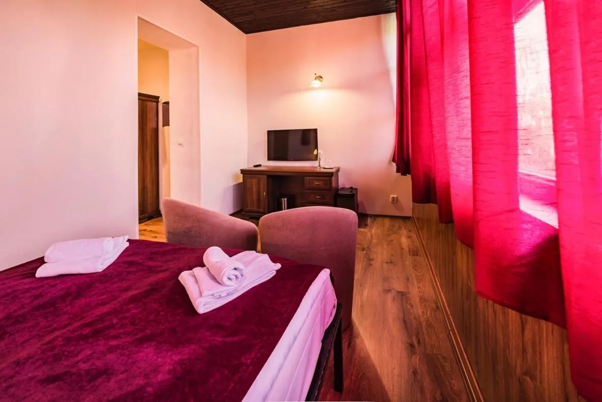 Bed in Penzion Benatky