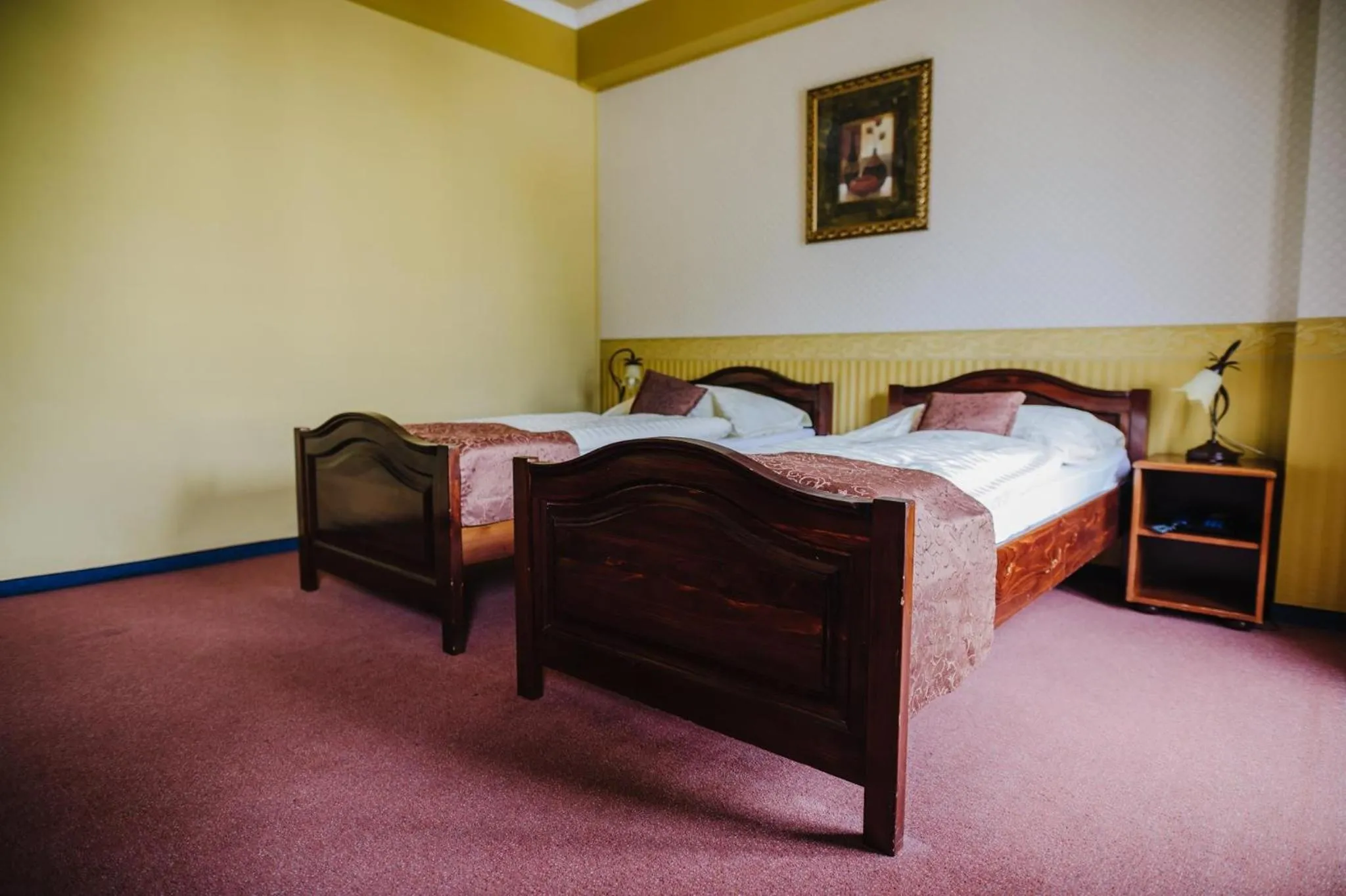 Bed in Hotel Gloria Palac