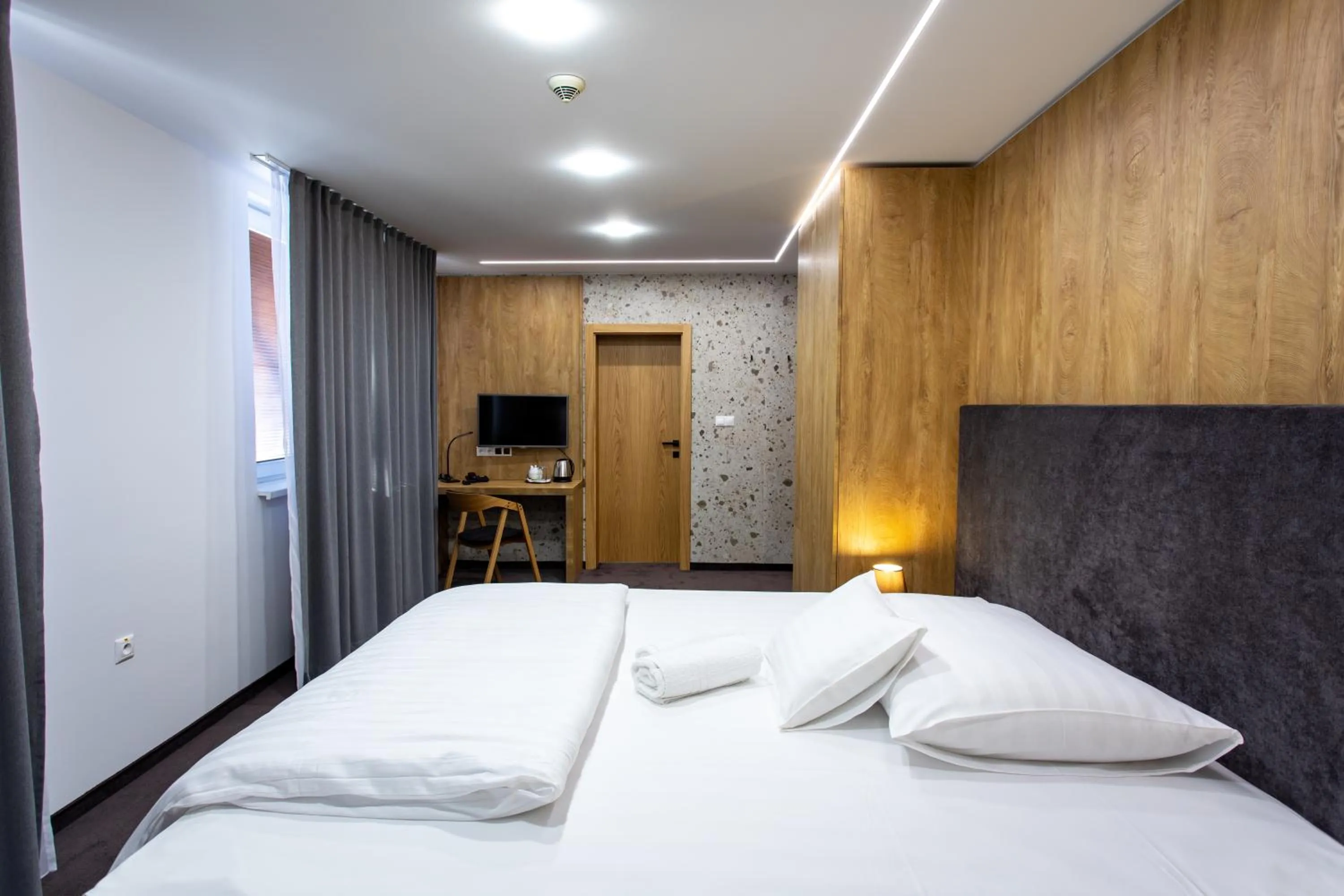 Photo of the whole room, Bed in Hotel Novy Kastiel - Self check-in