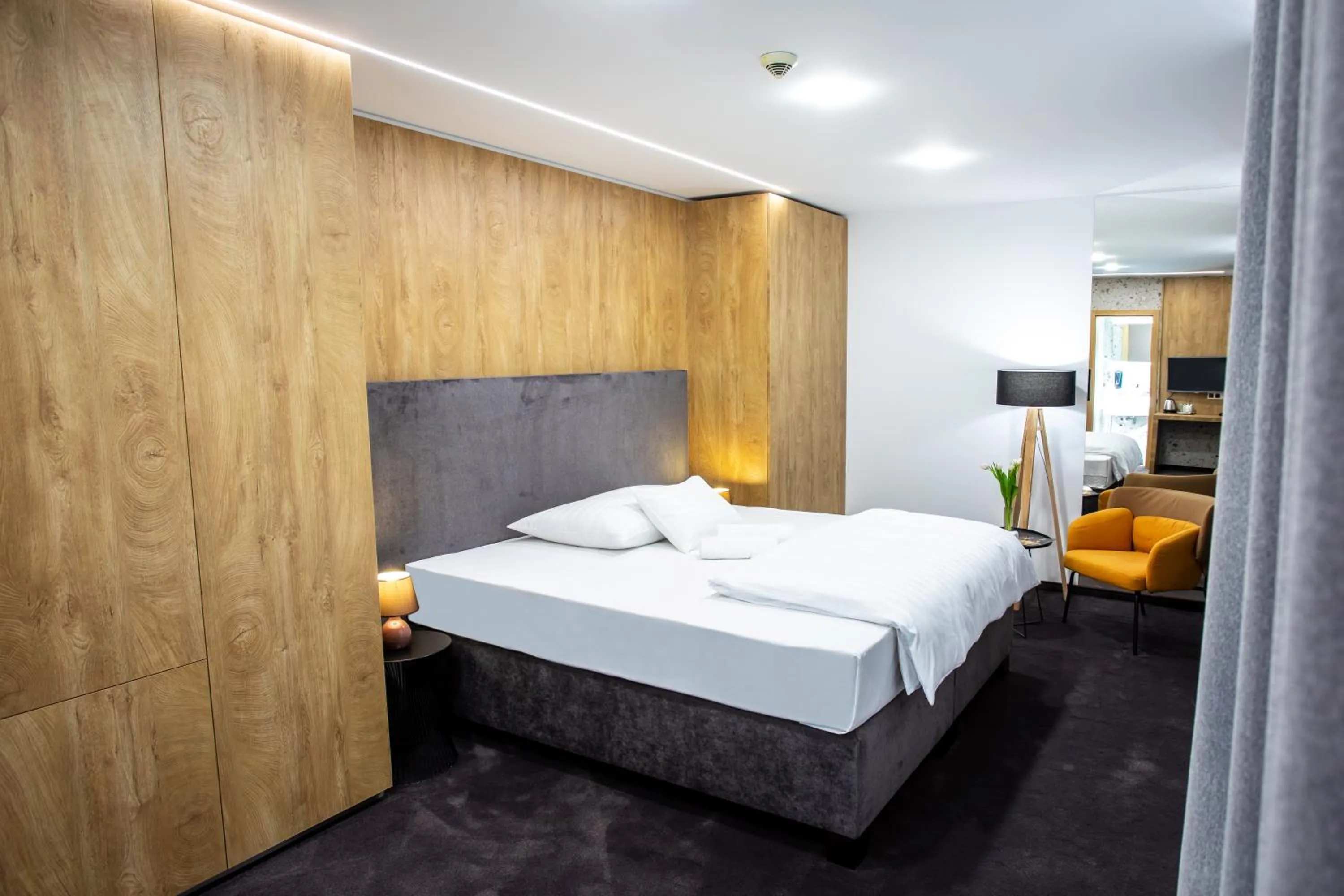 Photo of the whole room, Bed in Hotel Novy Kastiel - Self check-in