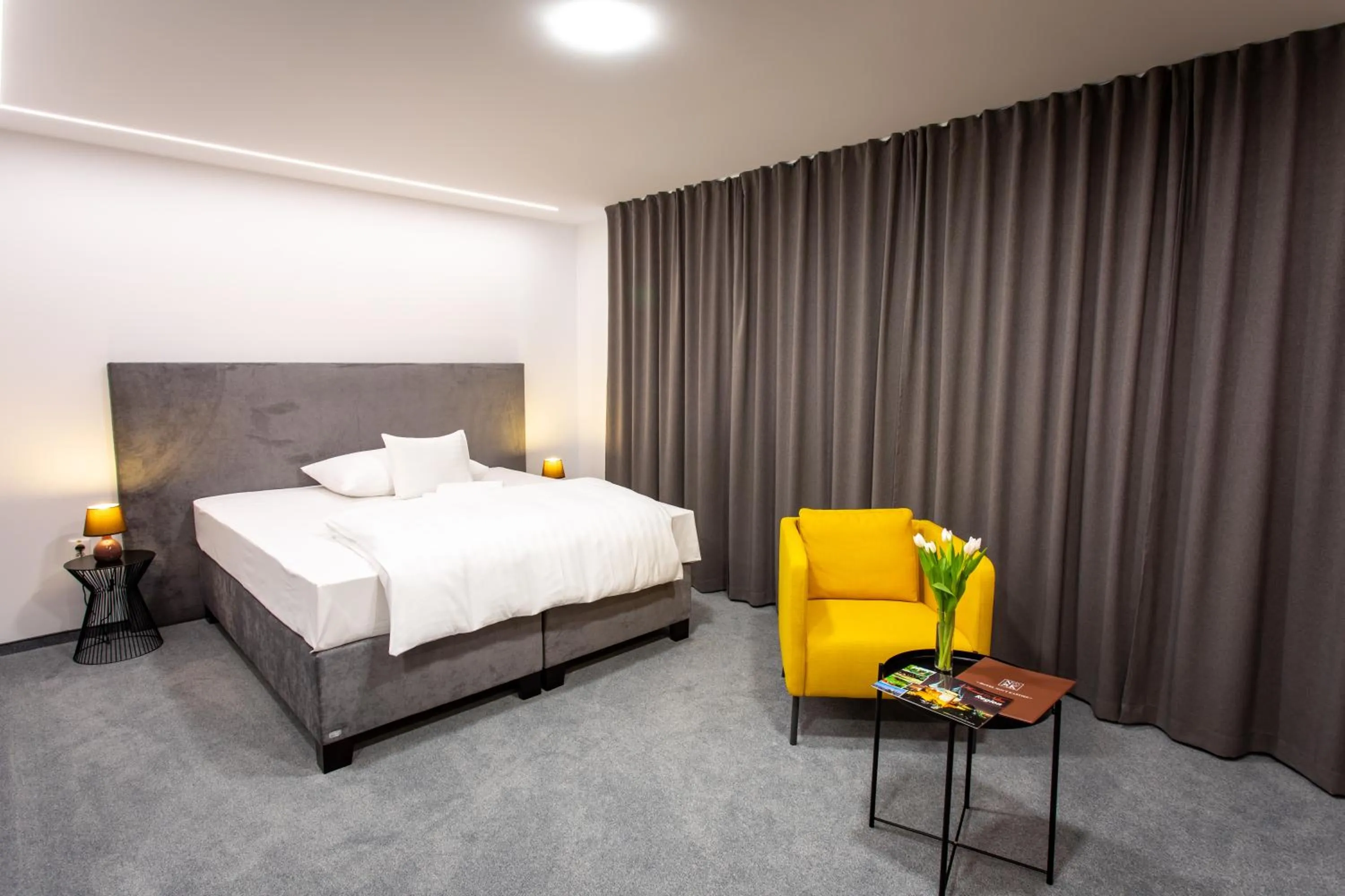 Photo of the whole room, Bed in Hotel Novy Kastiel - Self check-in