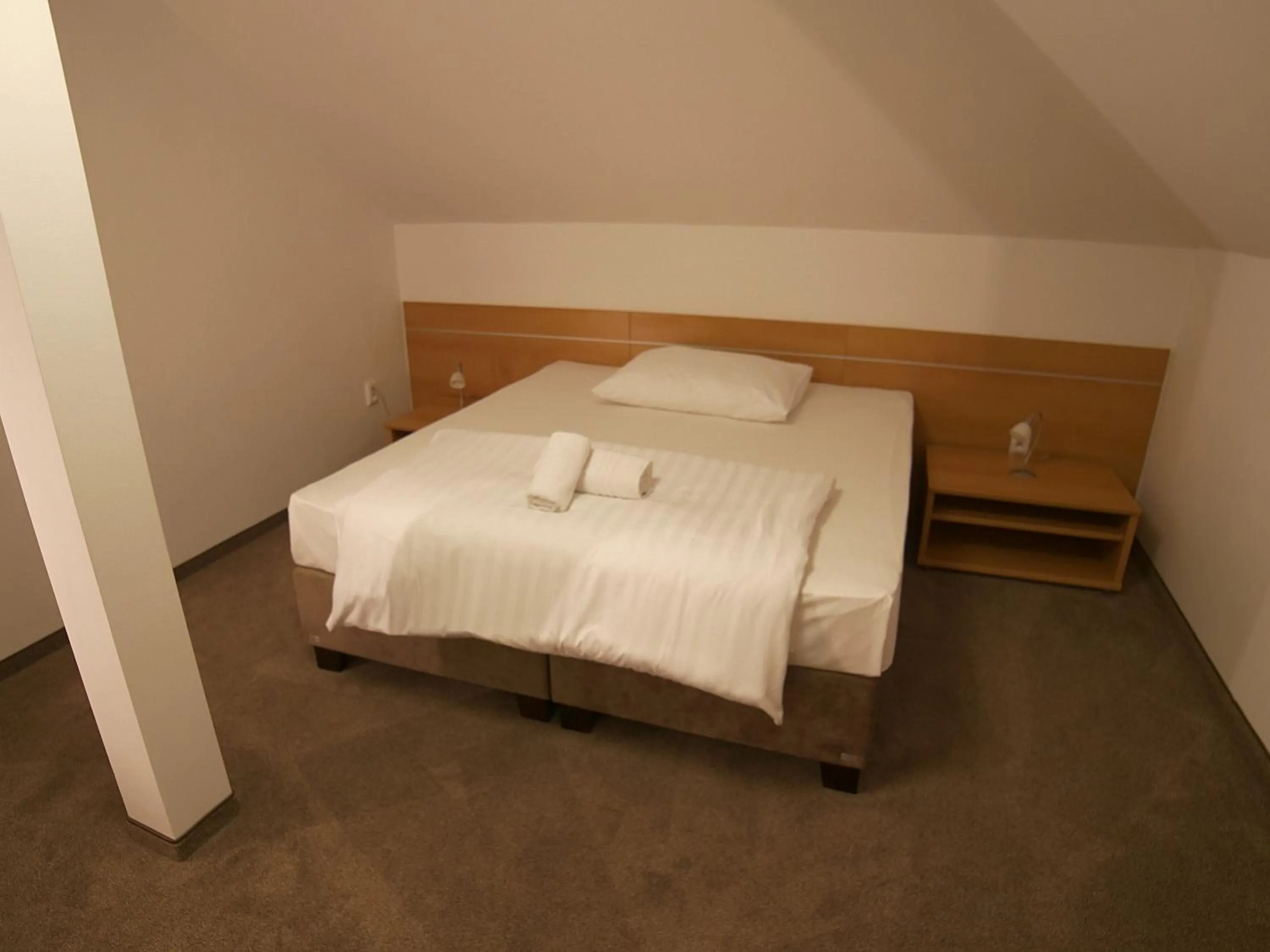 Photo of the whole room, Bed in Hotel Novy Kastiel - Self check-in