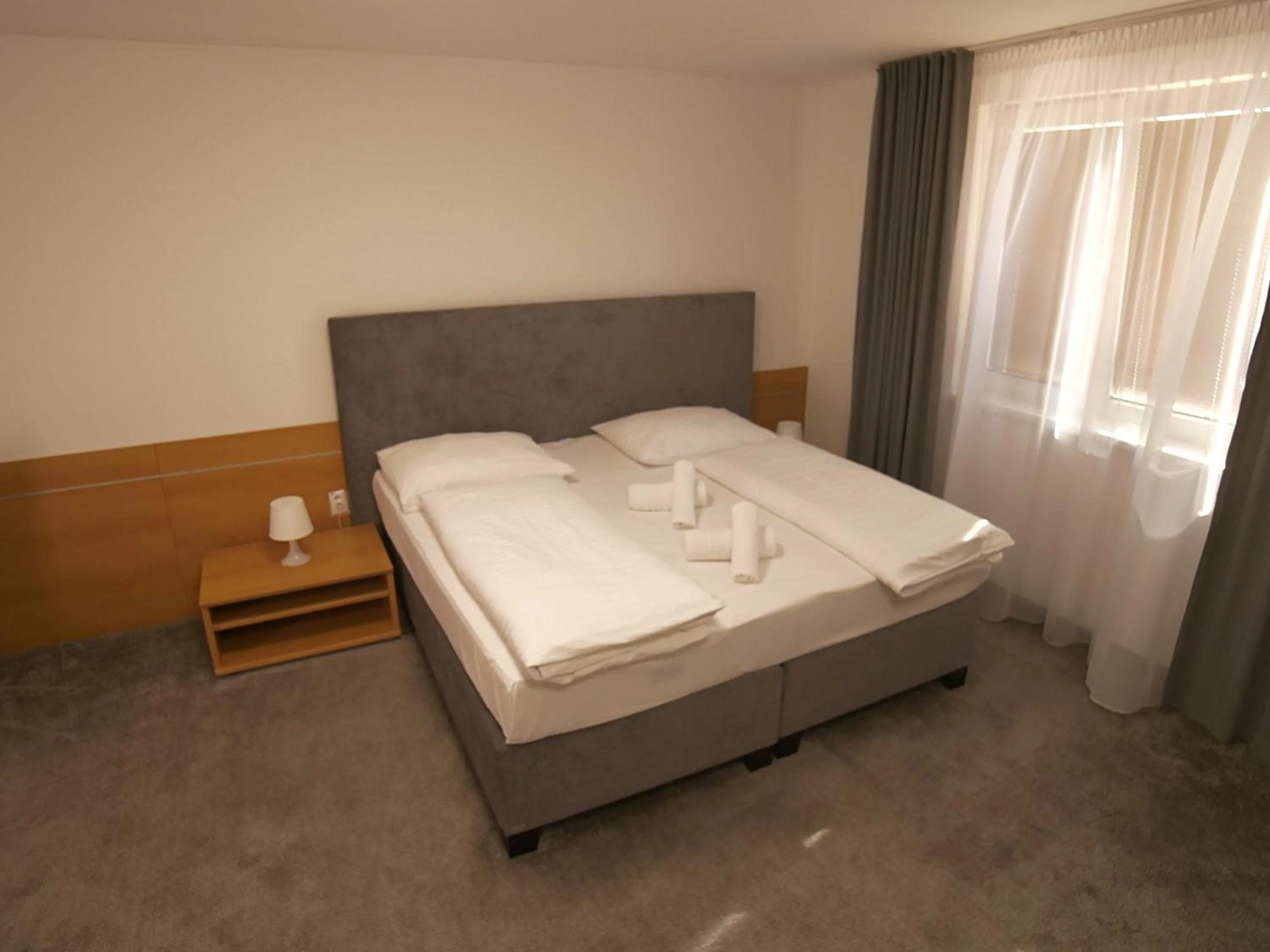 Photo of the whole room, Bed in Hotel Novy Kastiel - Self check-in