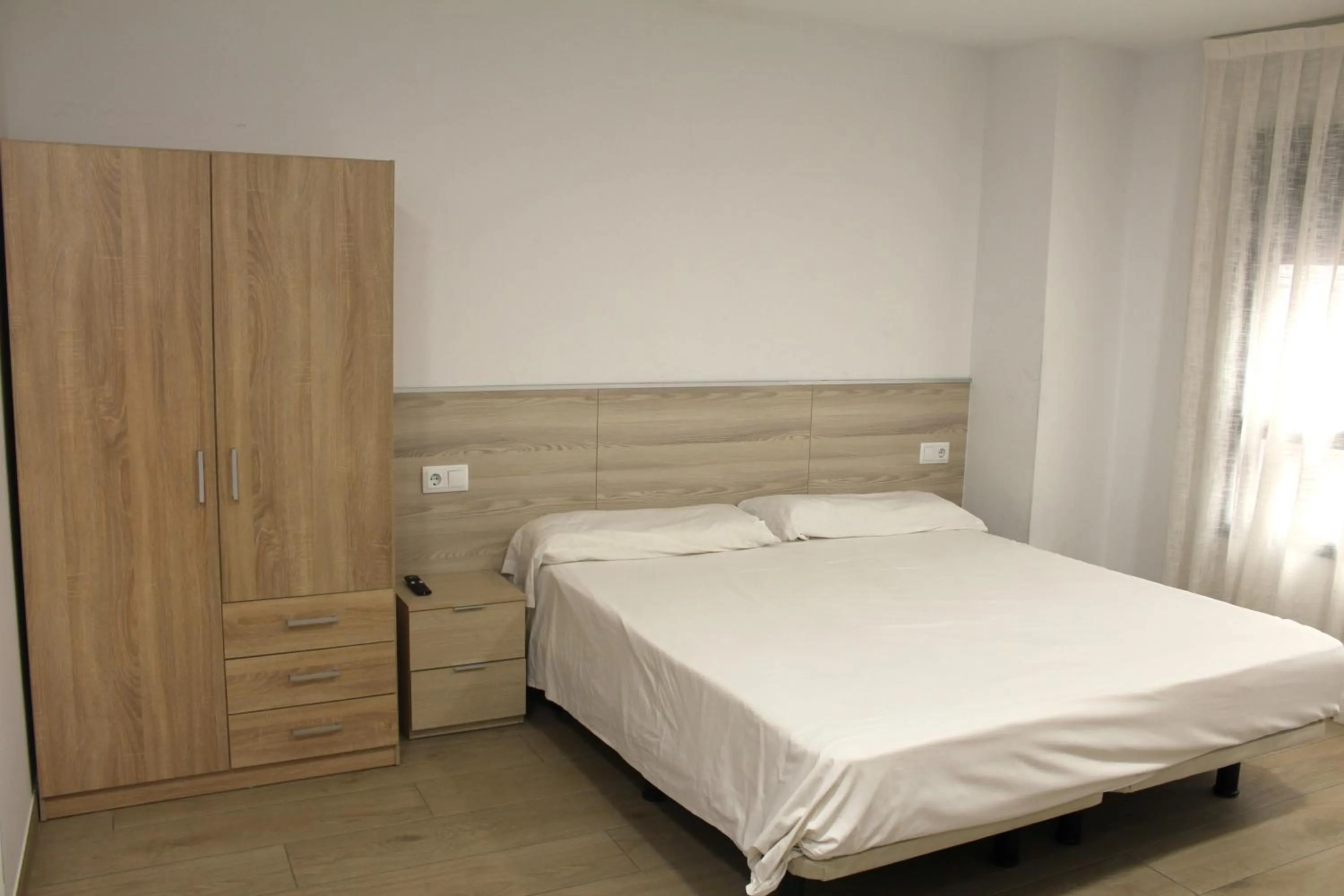 Bed in SM Apartments