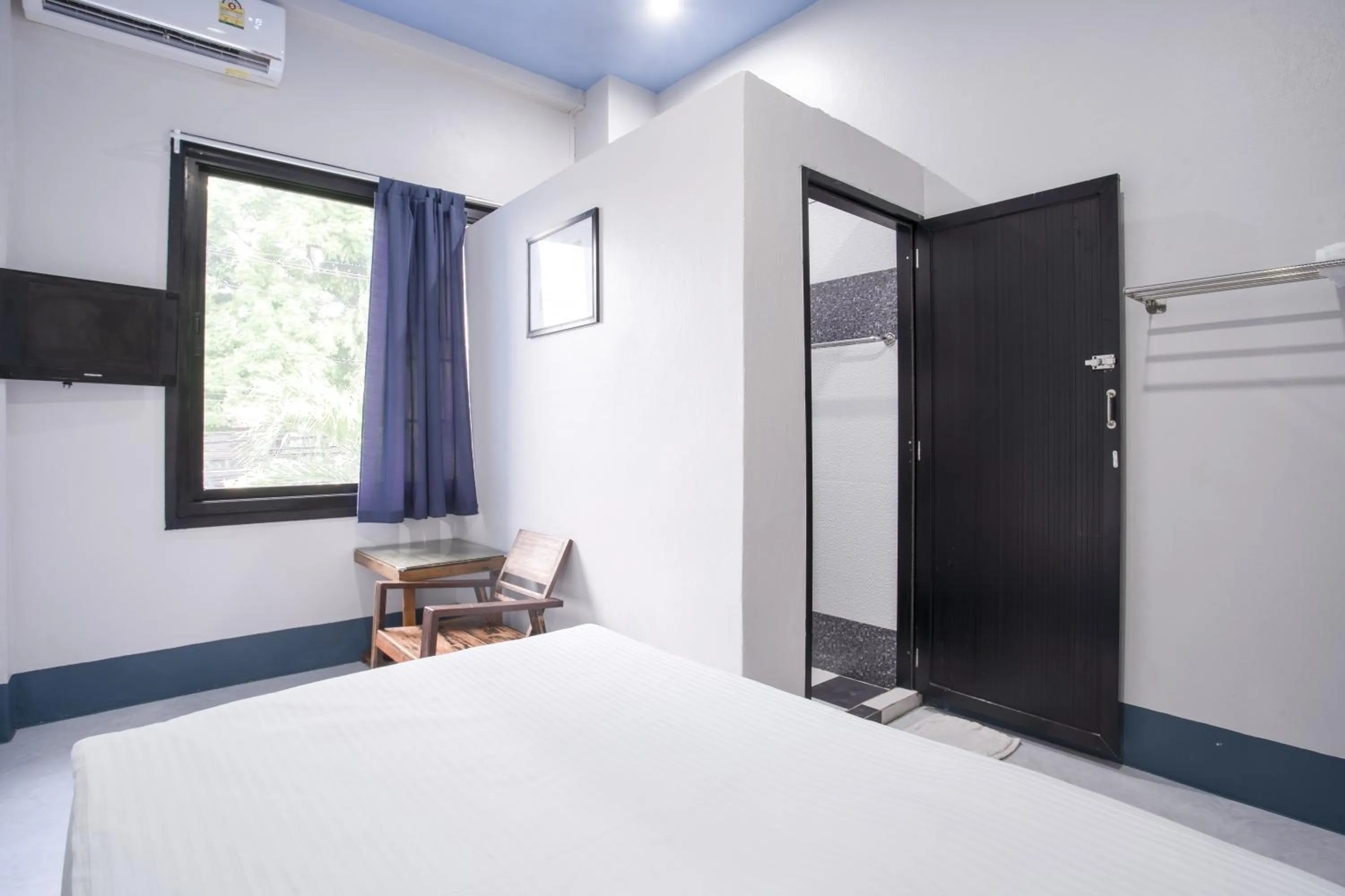 Bed in Udomsuk Hotel